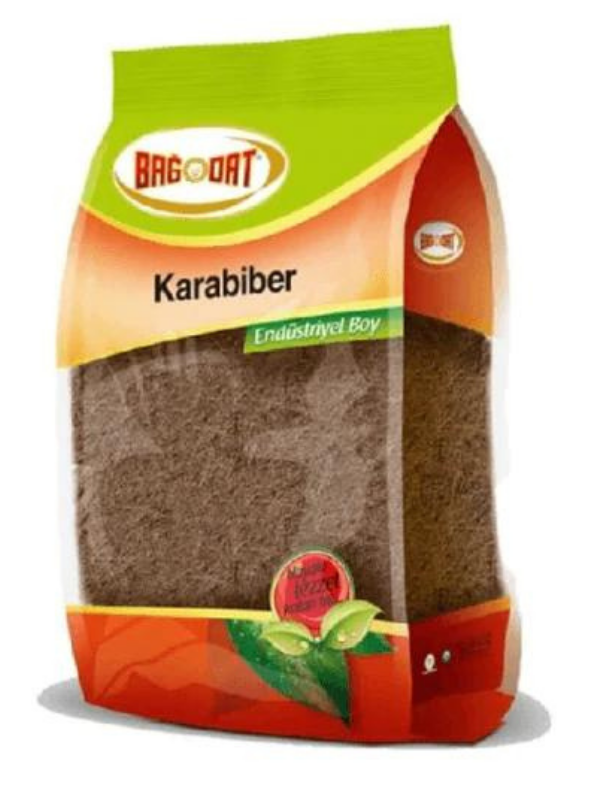 BAGDAT Black Pepper Ground in a 1 KG package, showcasing its rich black color and fine texture, perfect for seasoning various dishes.