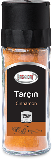 A jar of Bagdat Cinnamon Powder showcasing its rich brown color and fine texture, perfect for enhancing various dishes.