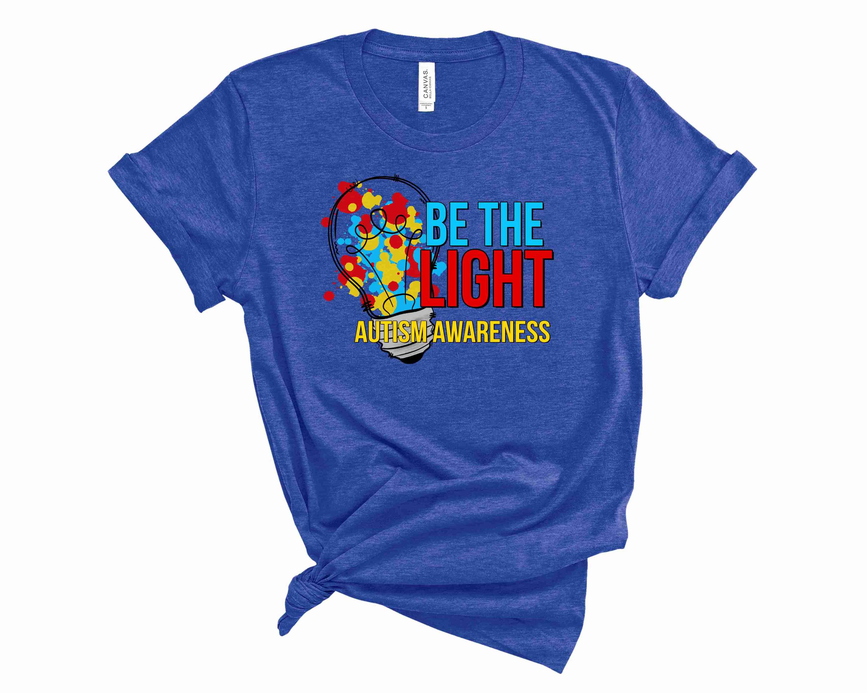 Be the Light Autism Awareness Graphic Tee featuring a vibrant design, suitable for all genders.