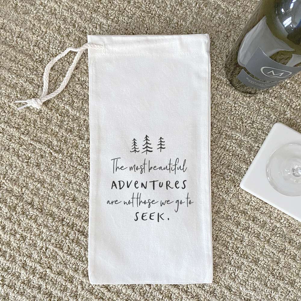 Beautiful Adventures canvas wine bag featuring a tree design, perfect for holding a 750mL wine bottle with a matching drawstring closure.