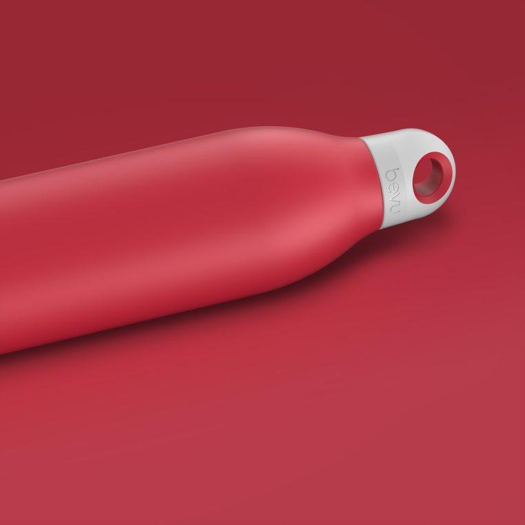 Bevu® Insulated Bottle in vibrant magenta color, showcasing its sleek design and double vacuum insulation features.