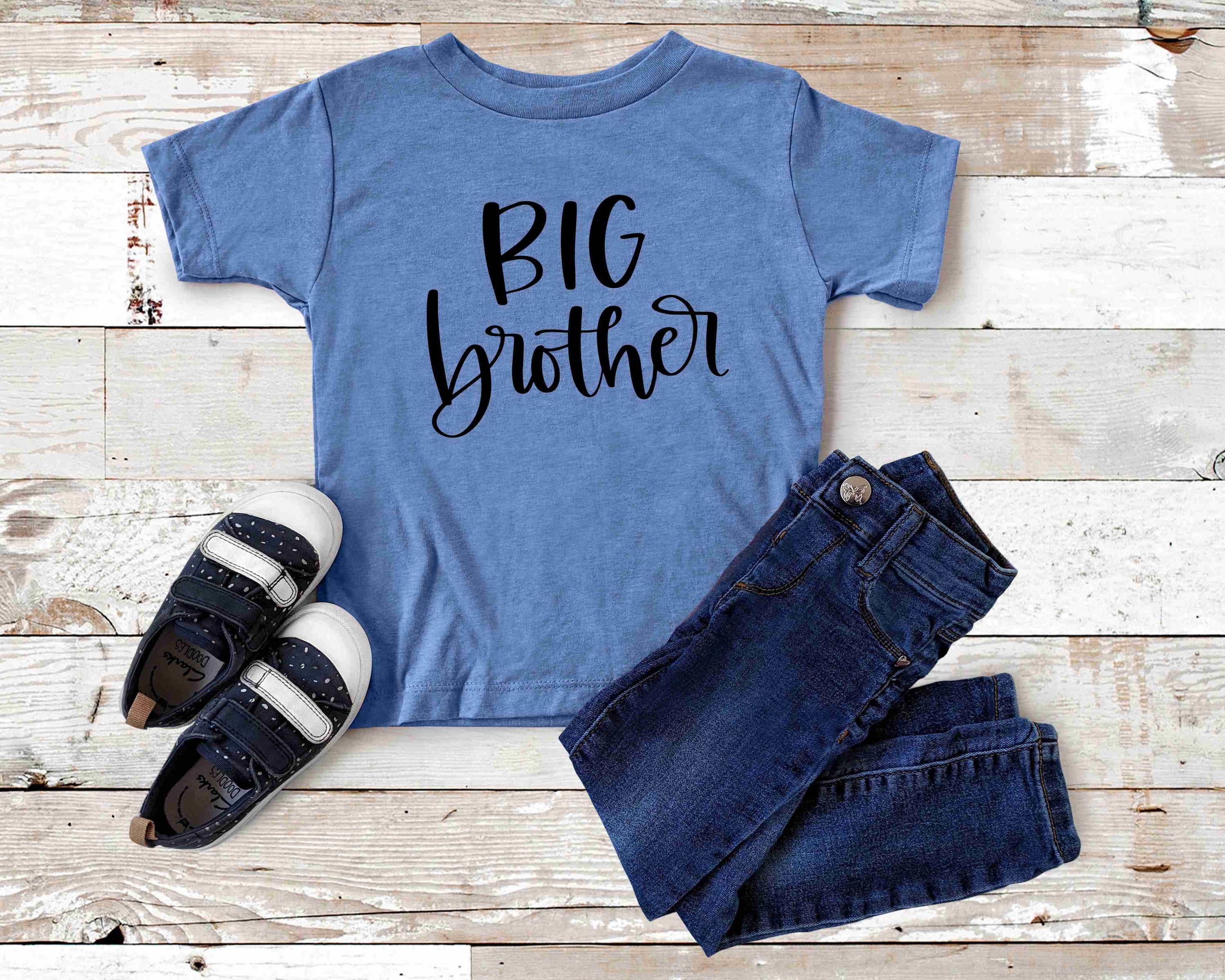 Big Brother Graphic Tee featuring bold text on a soft cotton fabric, suitable for all genders.