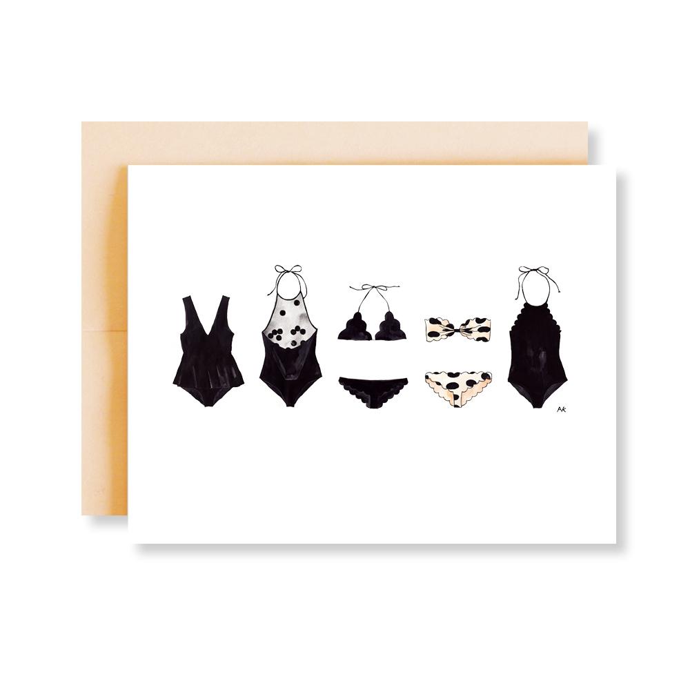 A beautifully illustrated blank card featuring a bikini swimsuit design, accompanied by a peach metallic envelope.