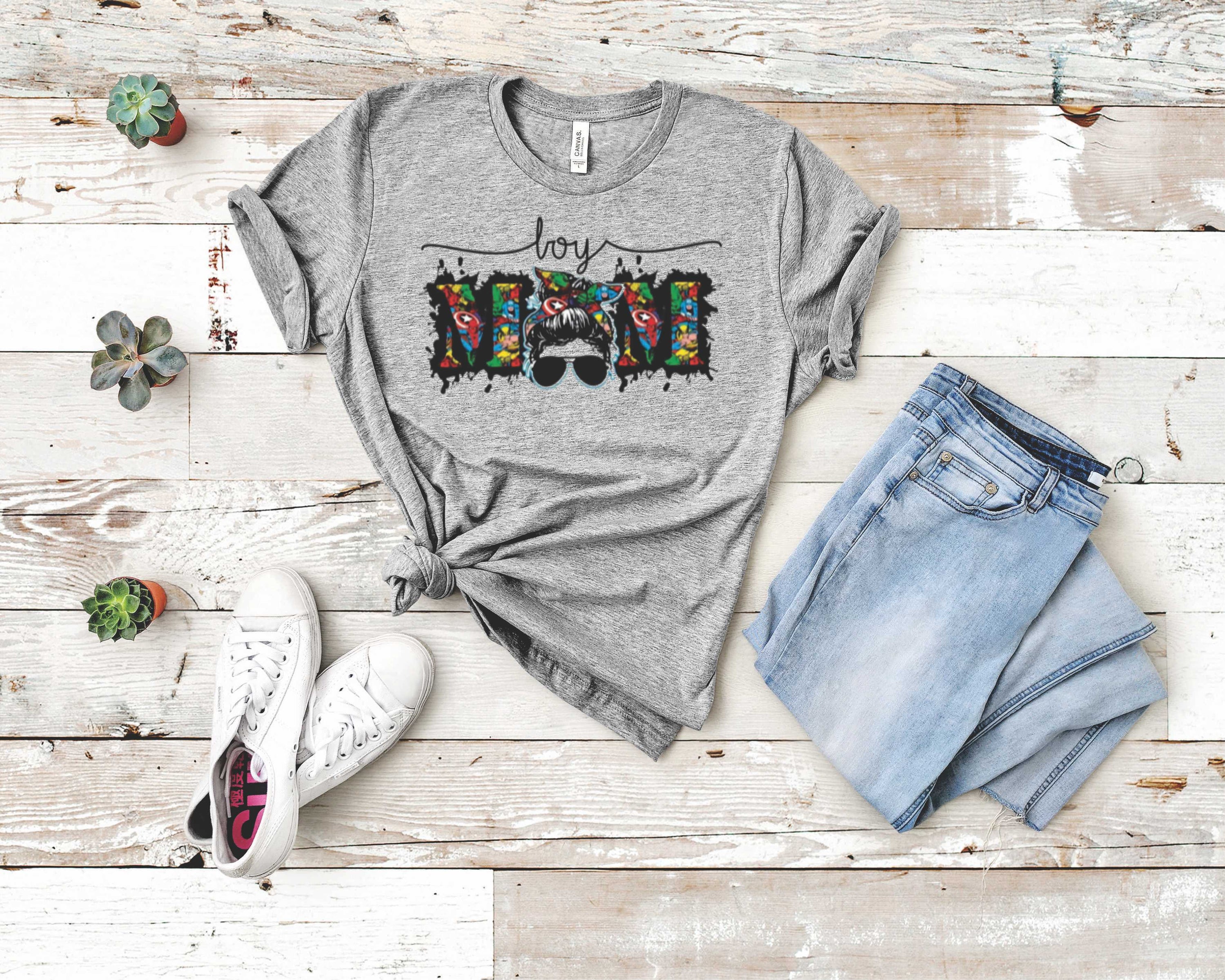 Boy Mom 4- Graphic Tee featuring a stylish design for mothers of boys, made from soft fabric.