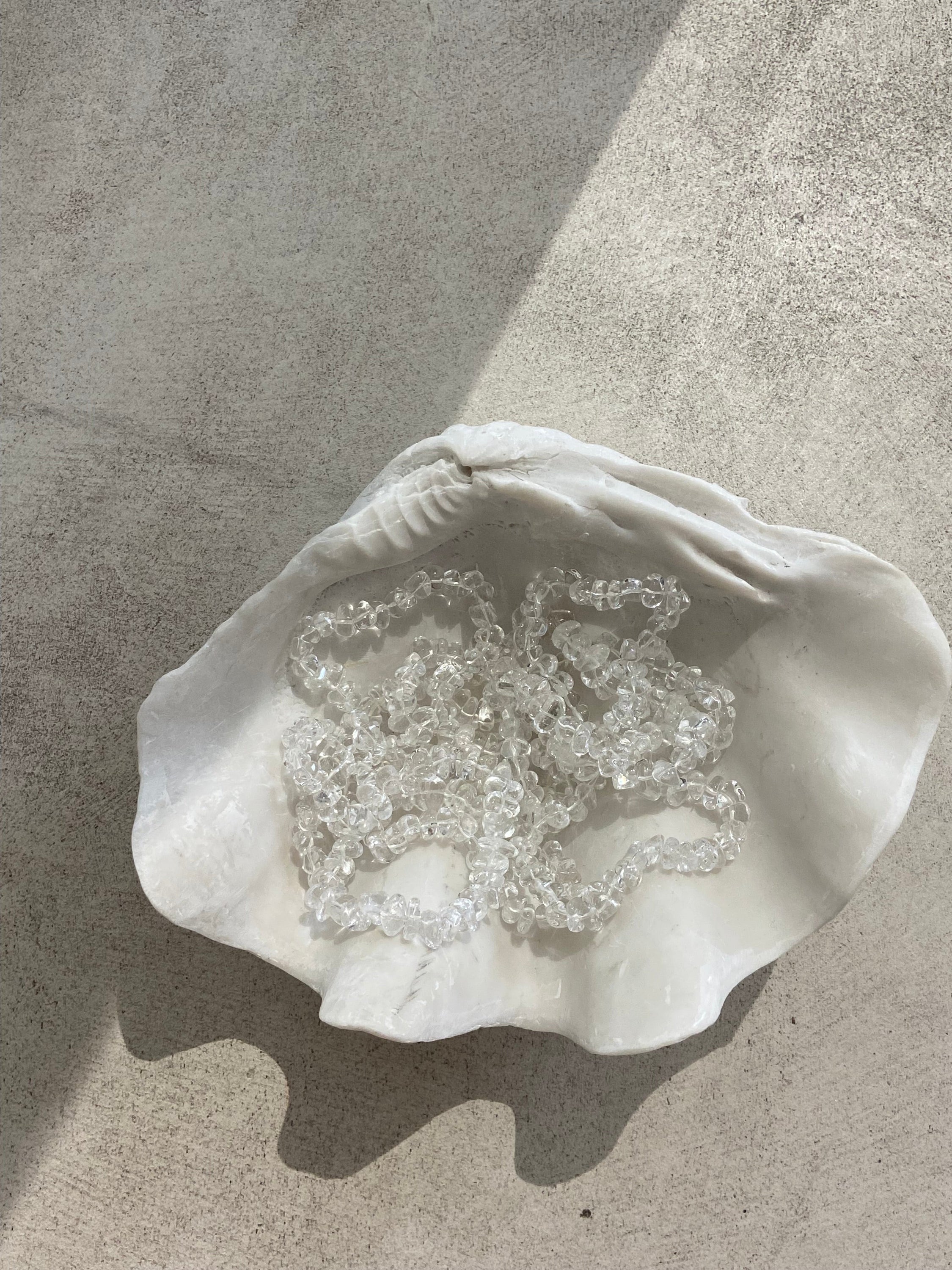 A beautiful bracelet made of large rock crystal fragments, symbolizing intuition and energy, designed for spiritual connection.