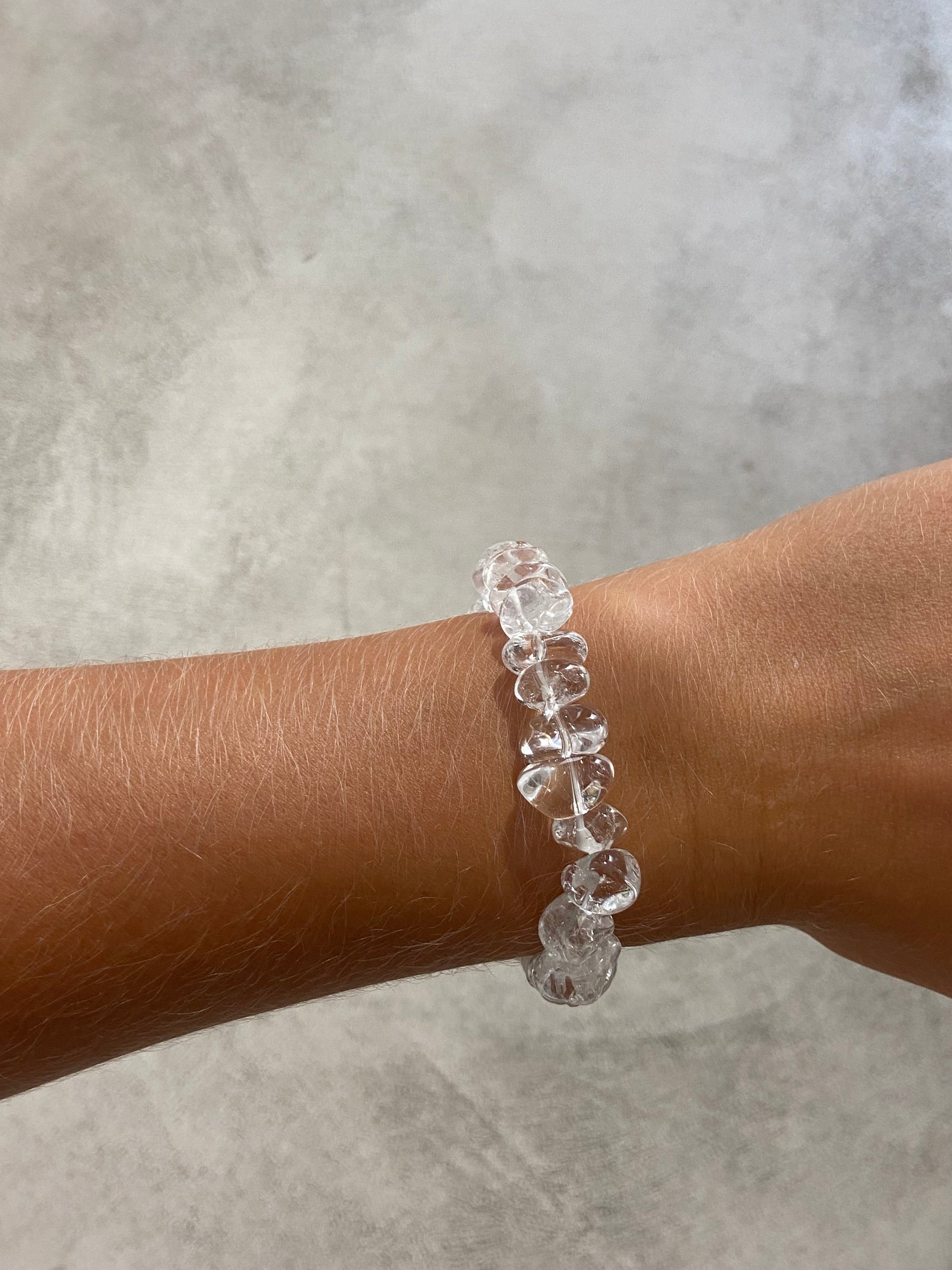 A beautiful bracelet made of large rock crystal fragments, symbolizing intuition and energy, designed for spiritual connection.