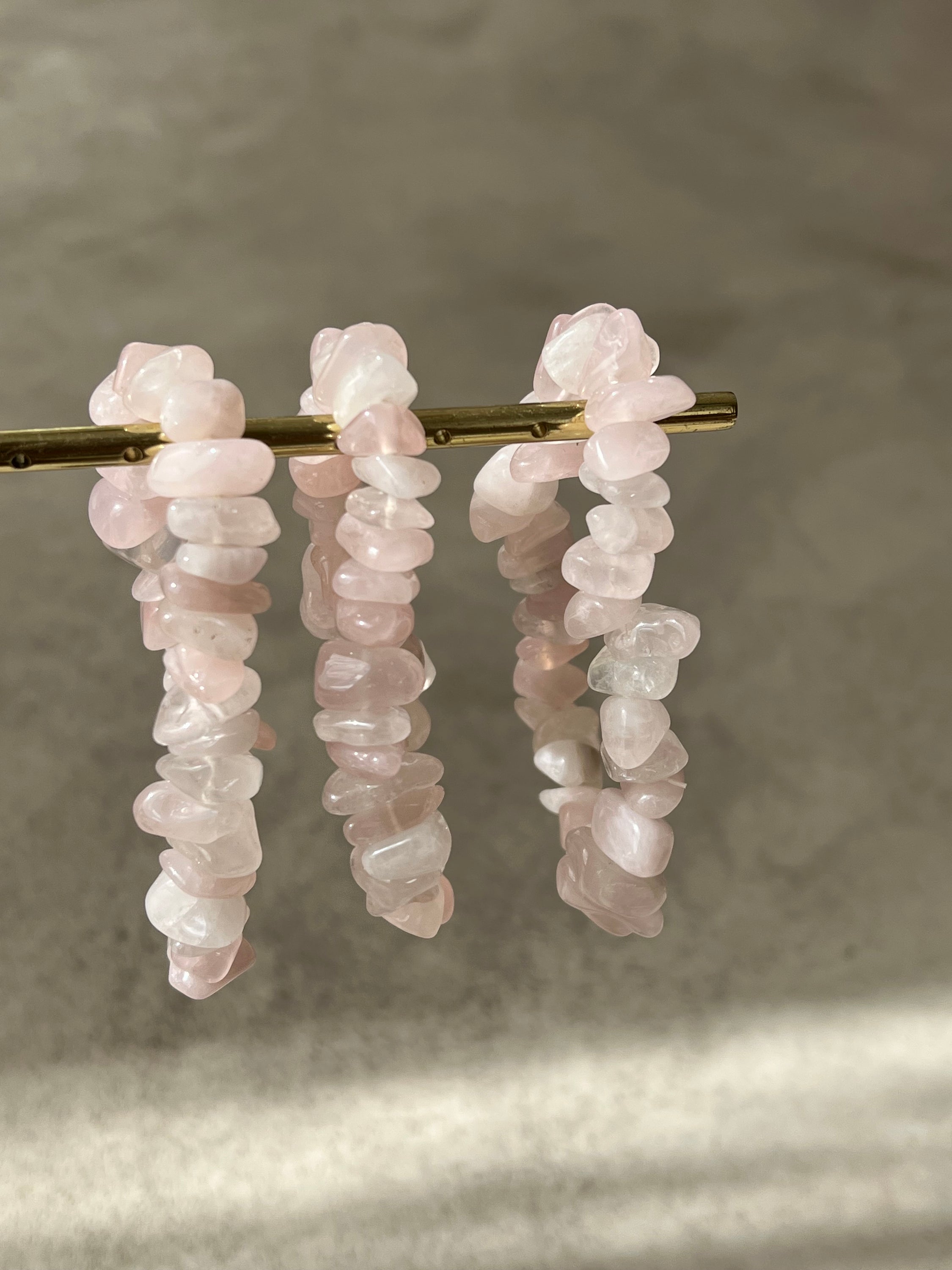 A beautiful bracelet made of large rose quartz fragments, symbolizing love and emotional healing, perfect for daily wear.