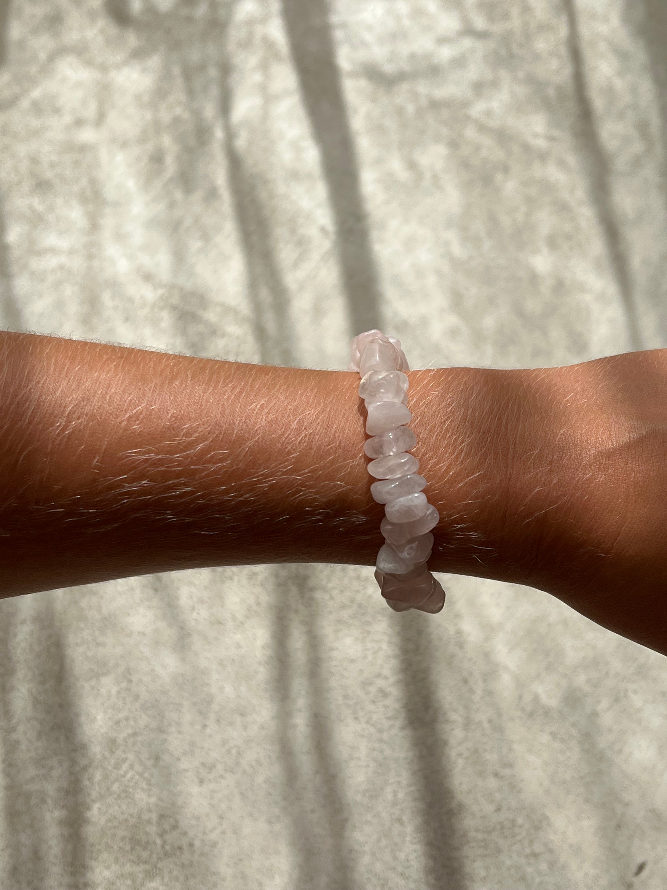 A beautiful bracelet made of large rose quartz fragments, symbolizing love and emotional healing, perfect for daily wear.