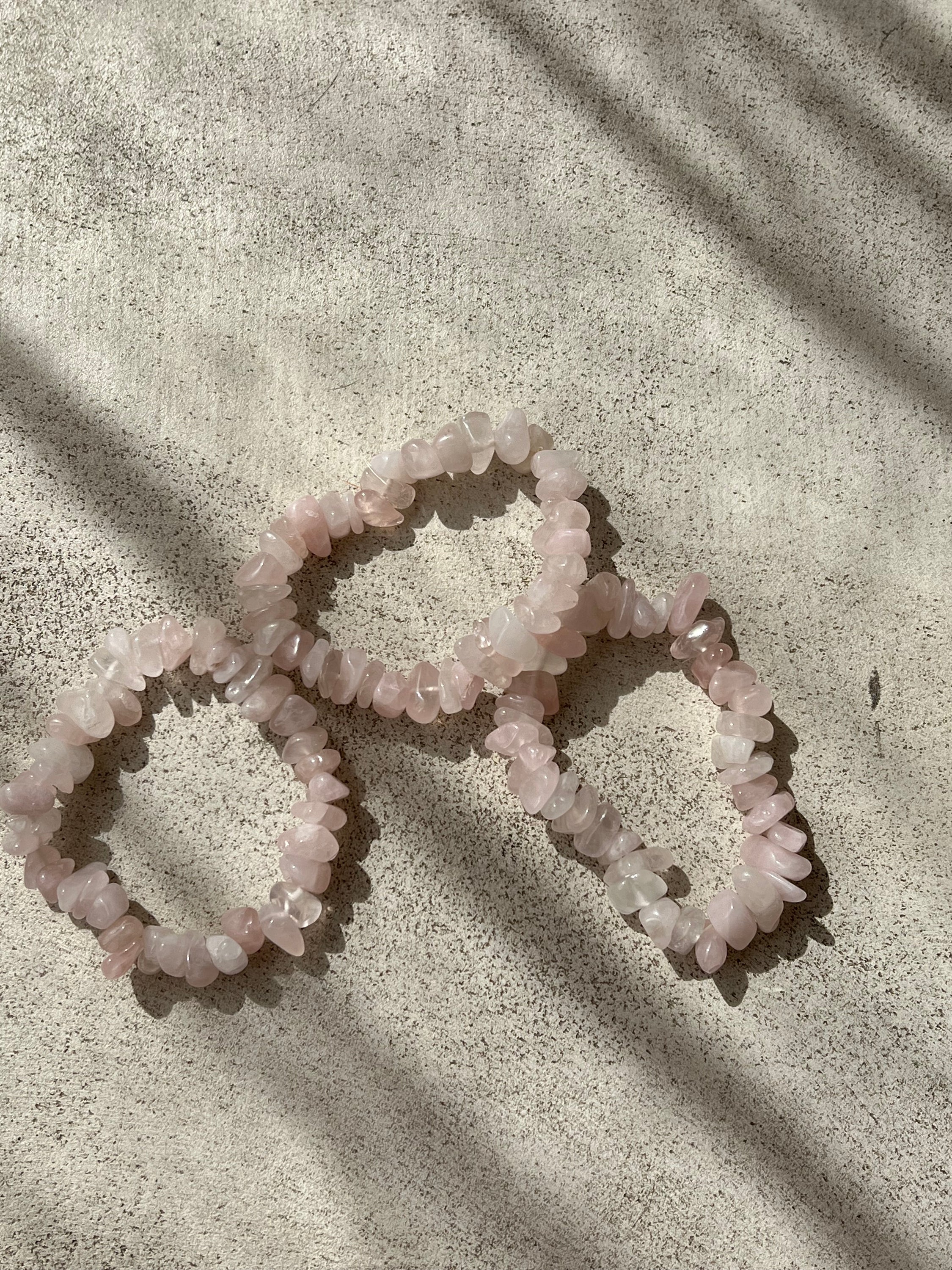 A beautiful bracelet made of large rose quartz fragments, symbolizing love and emotional healing, perfect for daily wear.