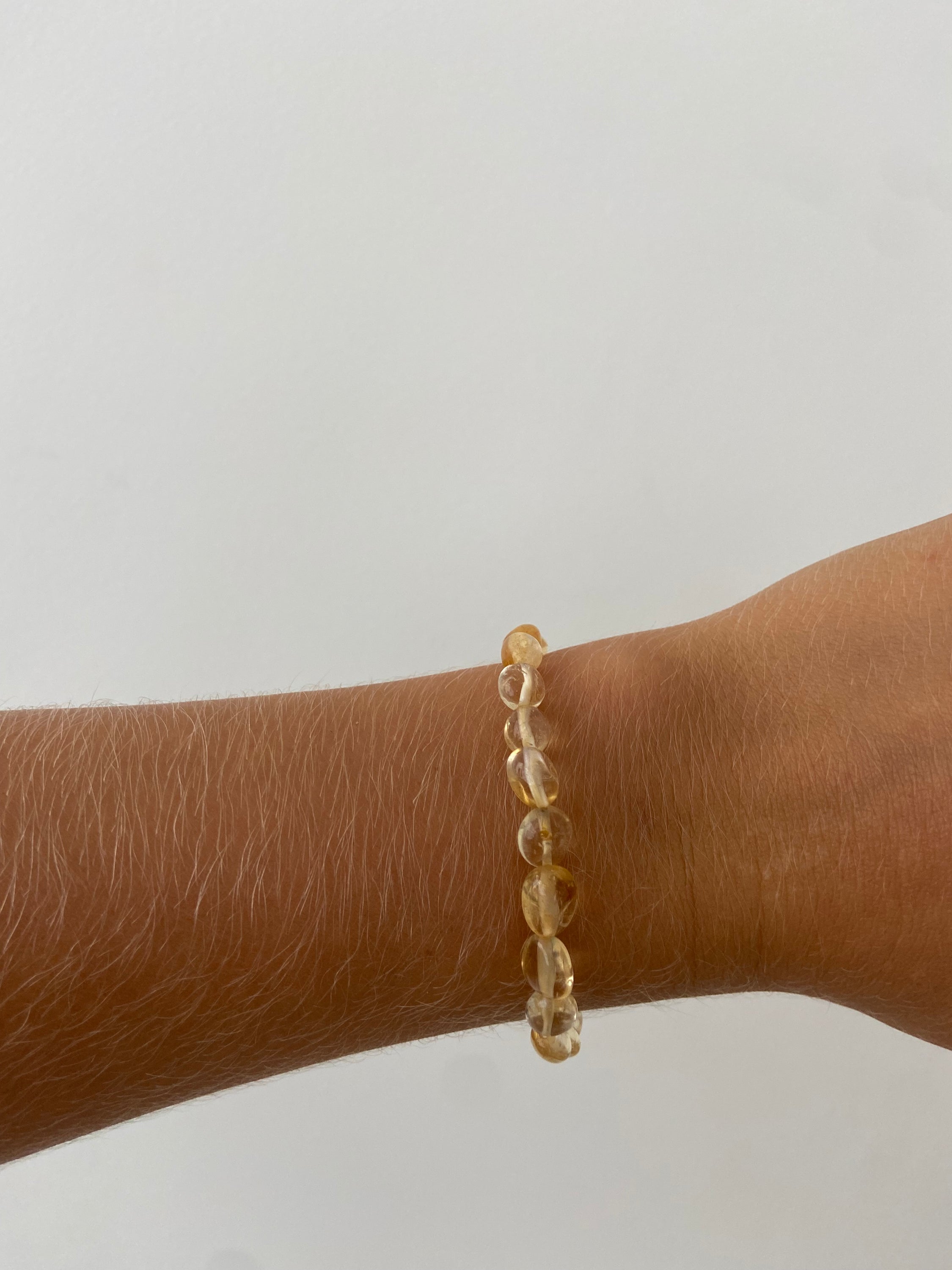A beautiful citrine energy bracelet featuring natural stones, symbolizing joy and abundance, perfect for enhancing self-confidence.