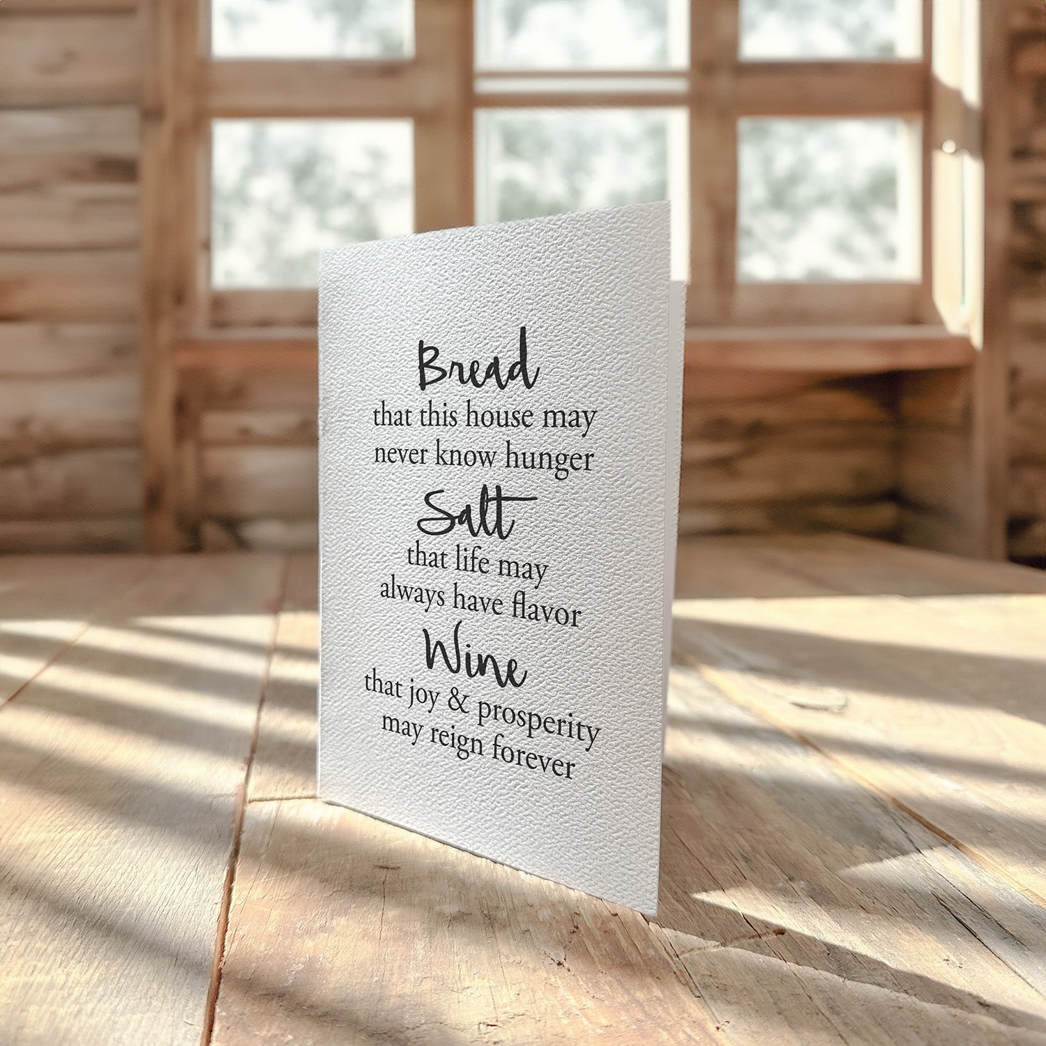 Bread, Salt, Wine greeting card on a white background, showcasing its elegant design and high-quality cardstock.