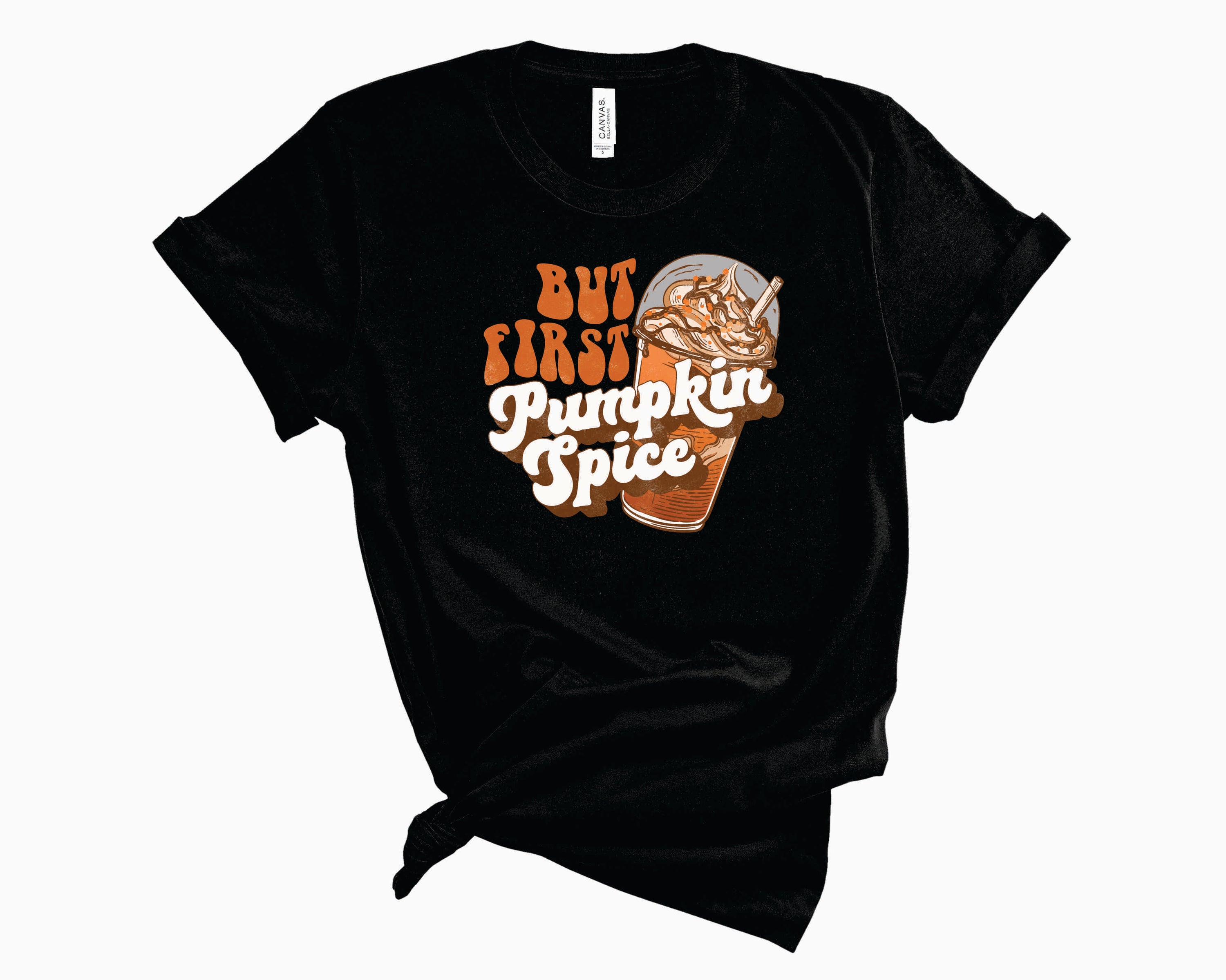 A cozy unisex graphic tee featuring the phrase 'But First Pumpkin Spice' in a stylish design, perfect for autumn wear.