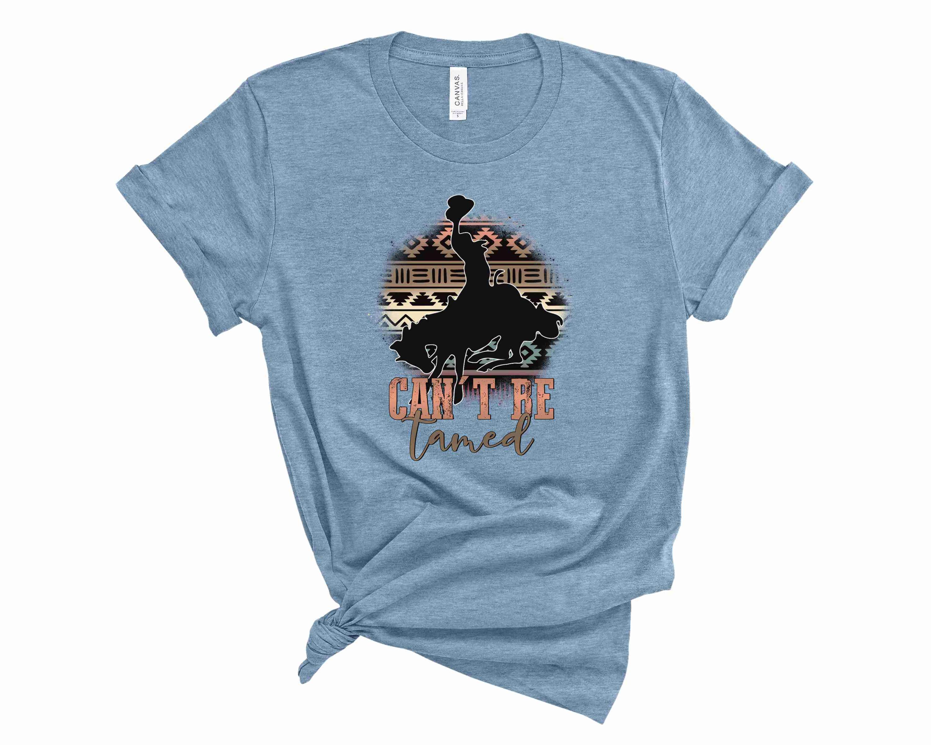 A stylish unisex graphic tee featuring the phrase 'Can't Be Tamed' in bold print, perfect for casual wear.