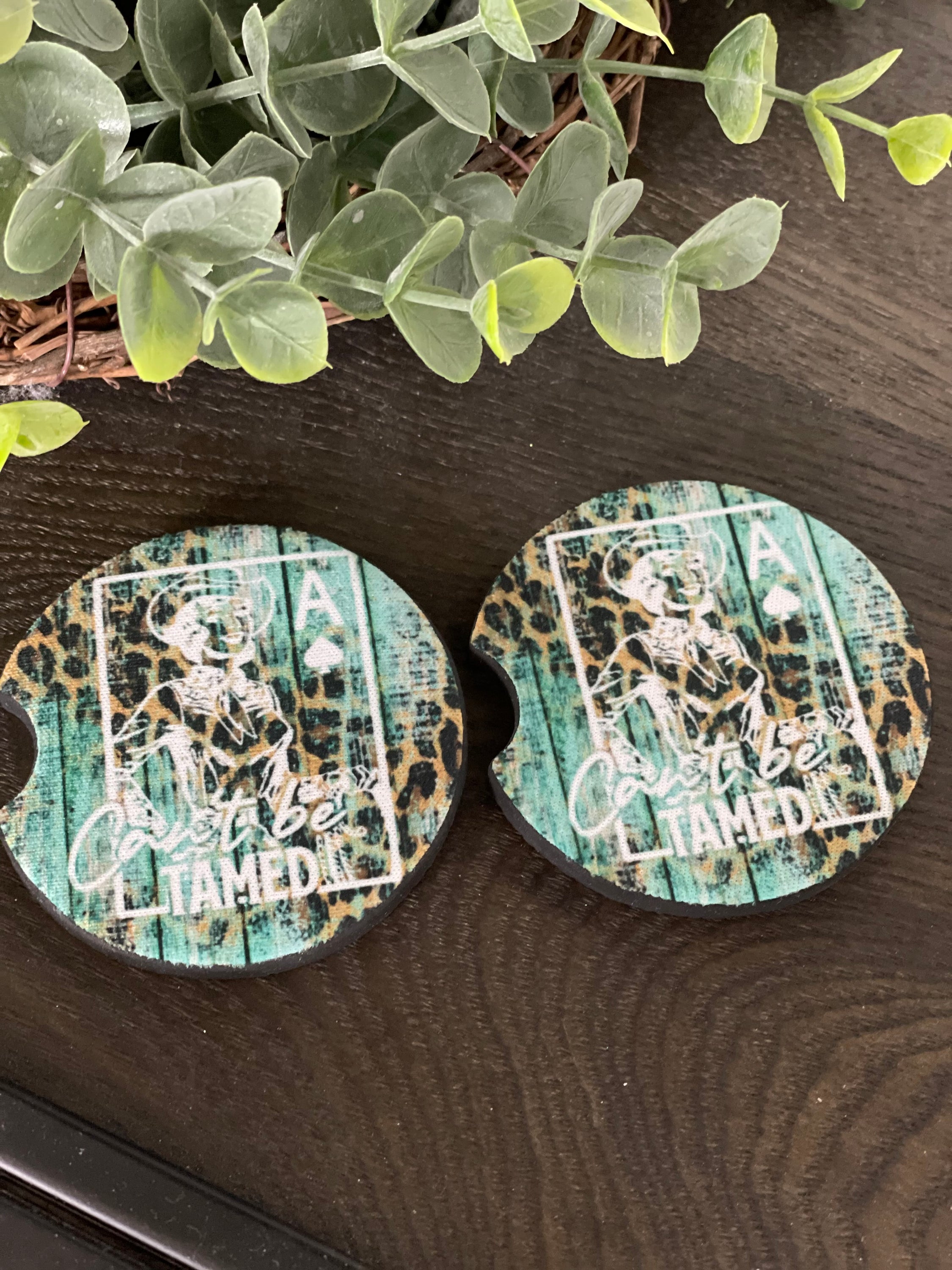 Can't Be Tamed neoprene car coaster set featuring a stylish Leopard Aztec design, perfect for vehicle interiors.