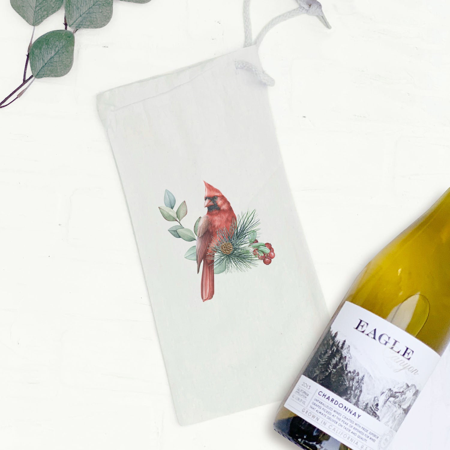 Cardinal Canvas Wine Bag featuring a vibrant bird design, perfect for holding a standard wine bottle.
