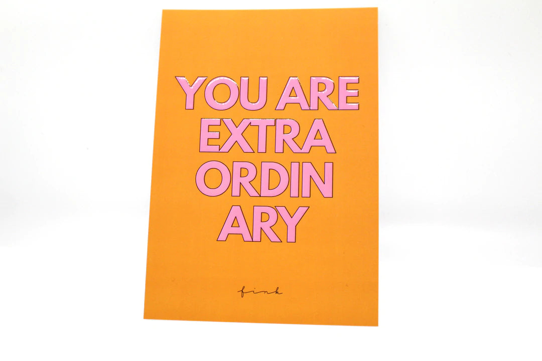 A beautifully designed greeting card with embossed text saying 'You Are Extraordinary', featuring a matching envelope.