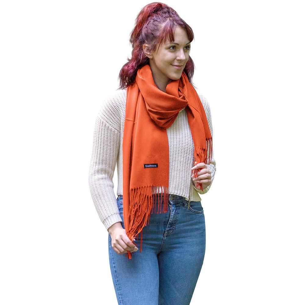 Luxurious solid color cashmere scarf, showcasing its soft texture and elegant drape, perfect for stylish warmth.