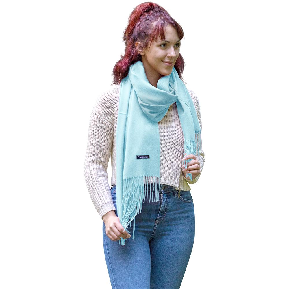 Luxurious solid color cashmere scarf, showcasing its soft texture and elegant drape, perfect for stylish warmth.