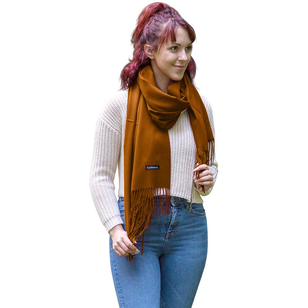 Luxurious solid color cashmere scarf, showcasing its soft texture and elegant drape, perfect for stylish warmth.