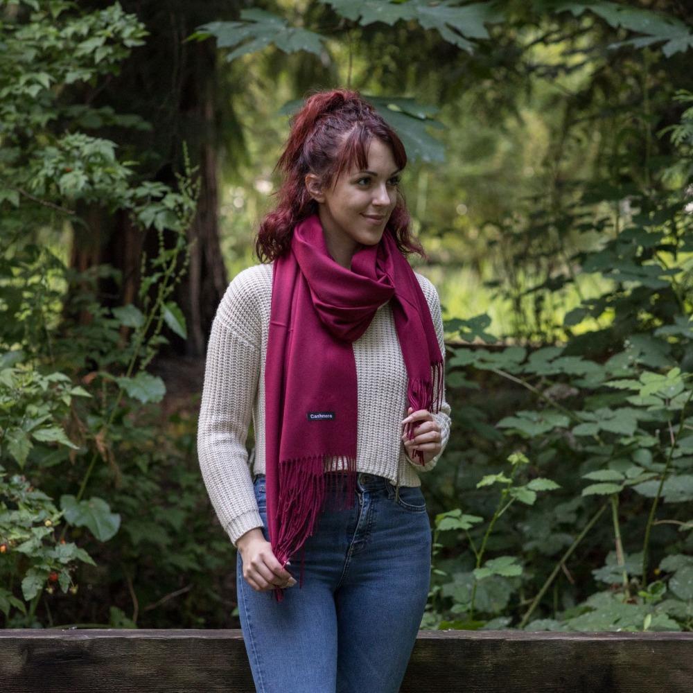 Luxurious solid color cashmere scarf, showcasing its soft texture and elegant drape, perfect for stylish warmth.