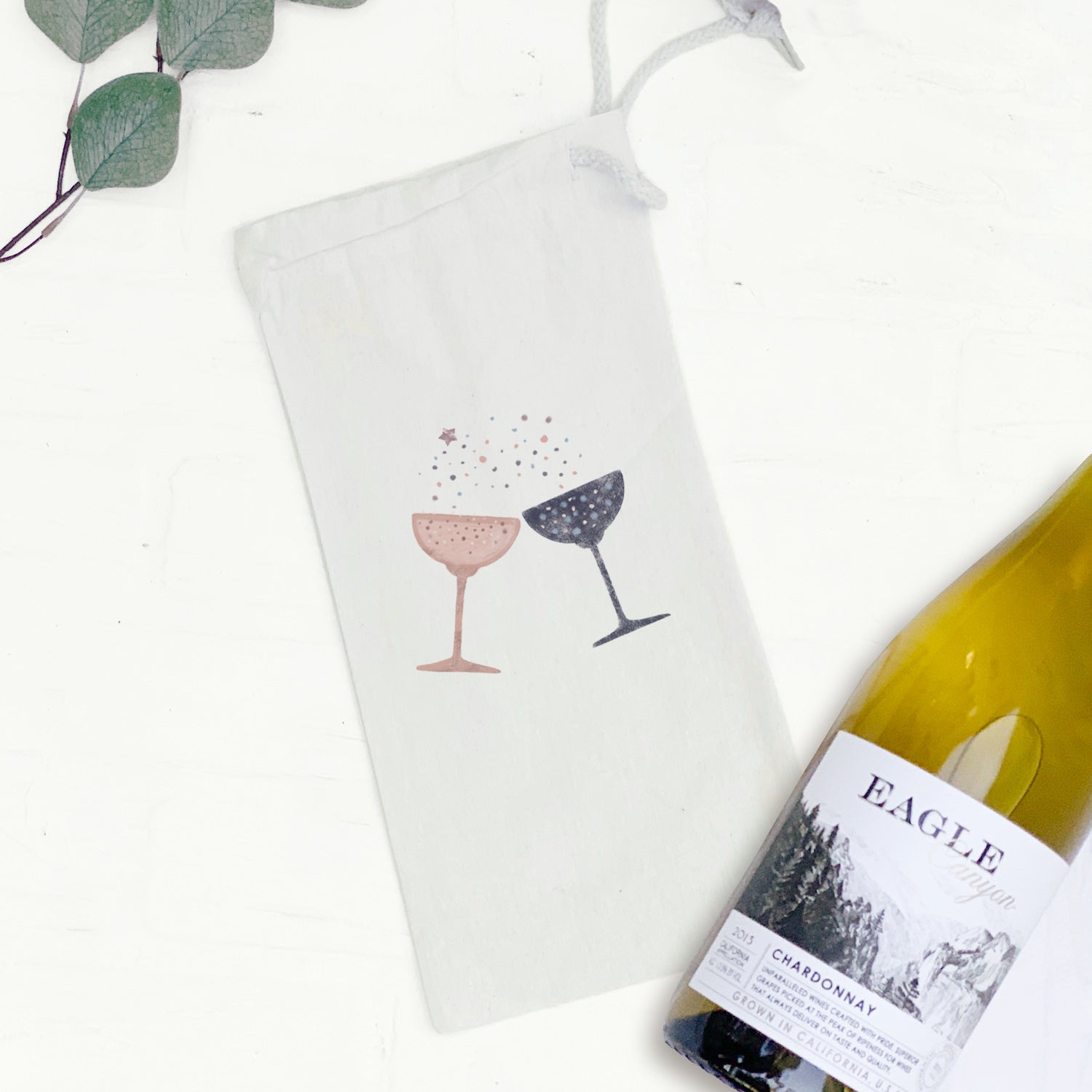 Champagne Toast canvas wine bag with drawstring closure, designed for 750mL bottles, featuring a stylish and eco-friendly design.