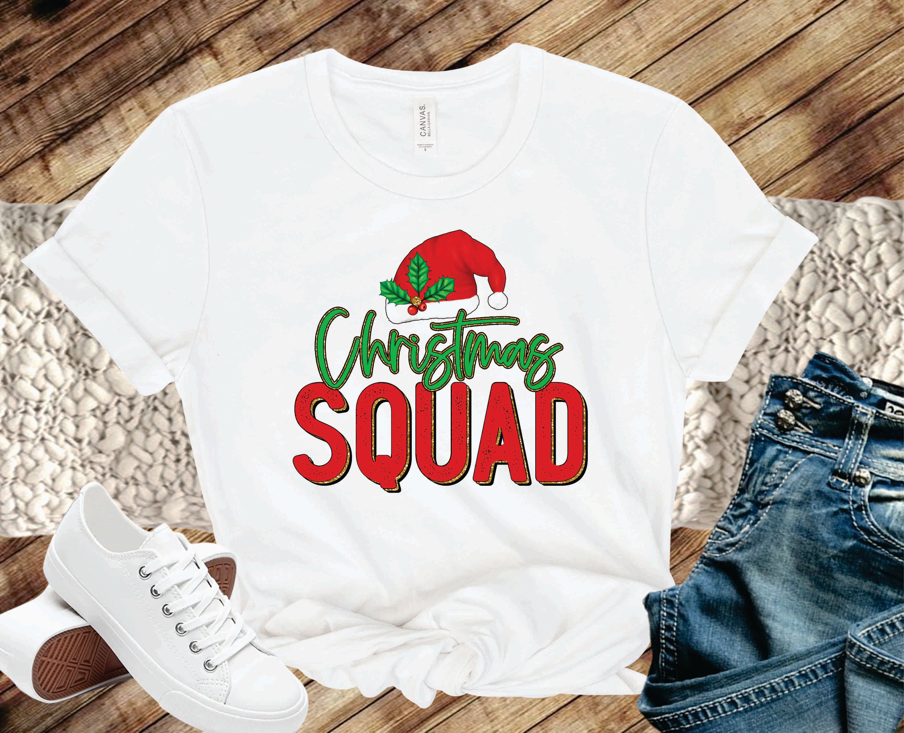 A festive unisex Christmas Squad Graphic Tee featuring vibrant holiday graphics, perfect for celebrating the season.