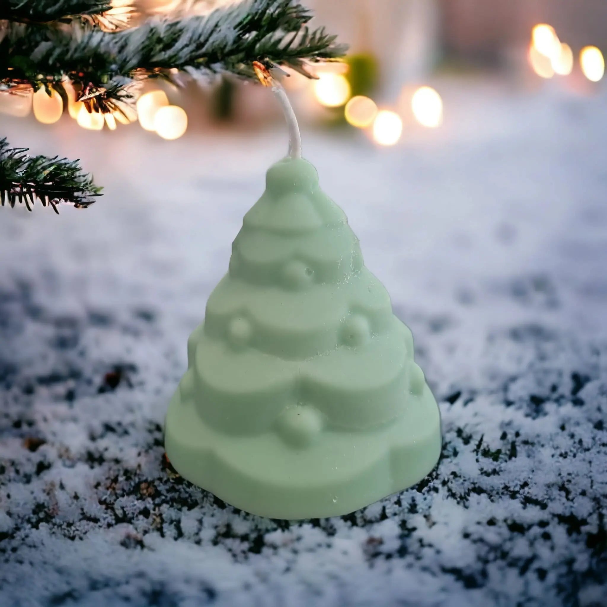 A beautifully crafted Christmas Tree Rosemary & Bay Wreath Candle, showcasing its elegant design and festive colors, perfect for holiday decor.