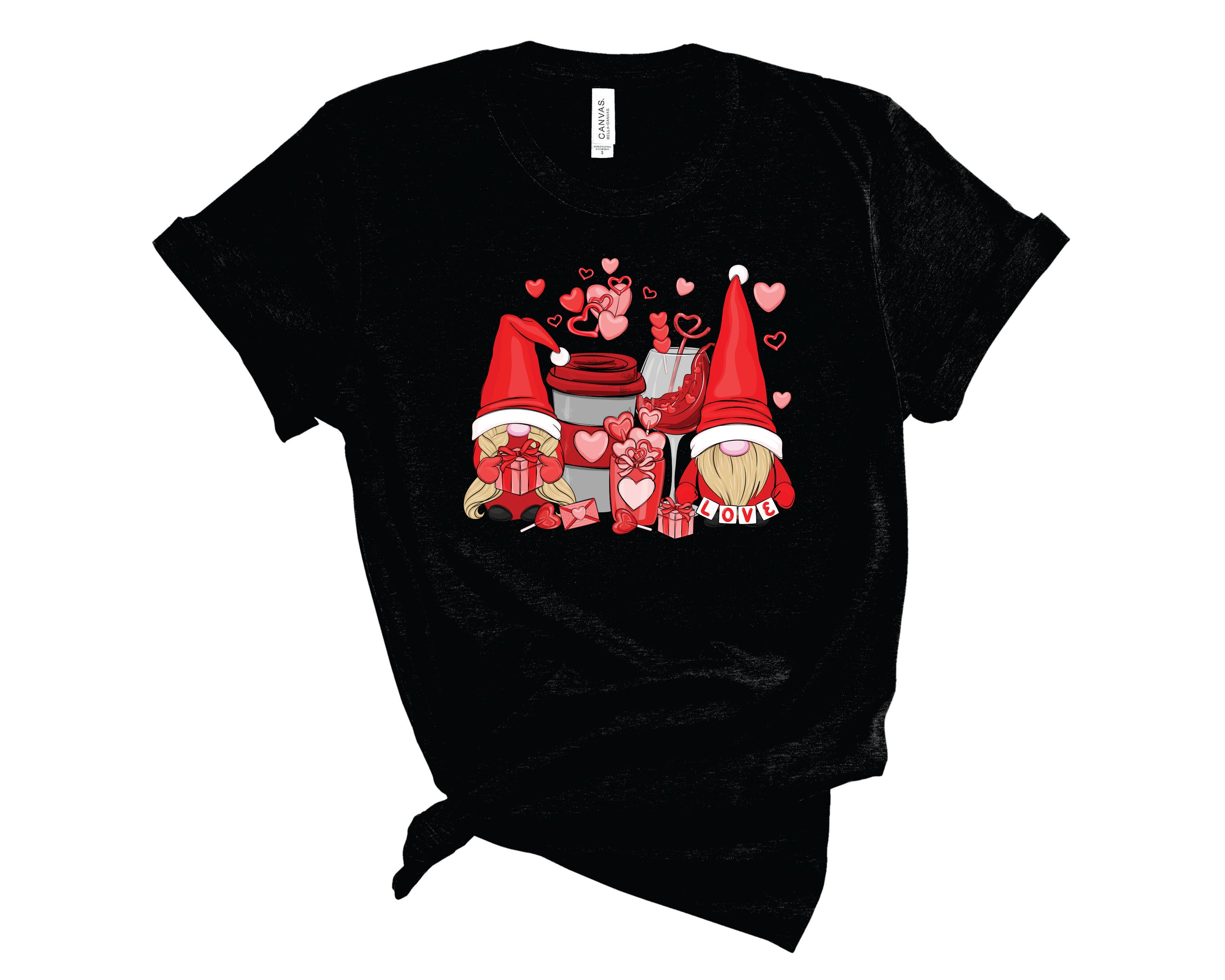 A unisex graphic tee featuring whimsical gnomes enjoying coffee and wine, perfect for casual wear.