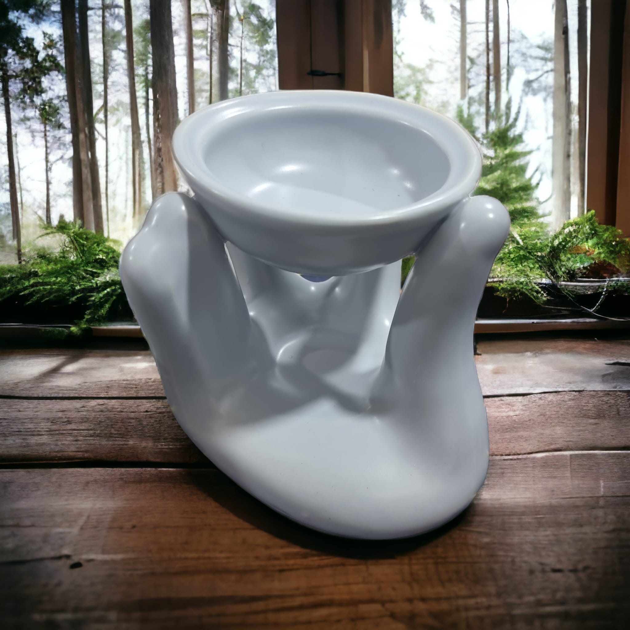 Elegant Hand Wax Melt Burner with a stylish design, perfect for melting wax melts and enhancing home ambiance.