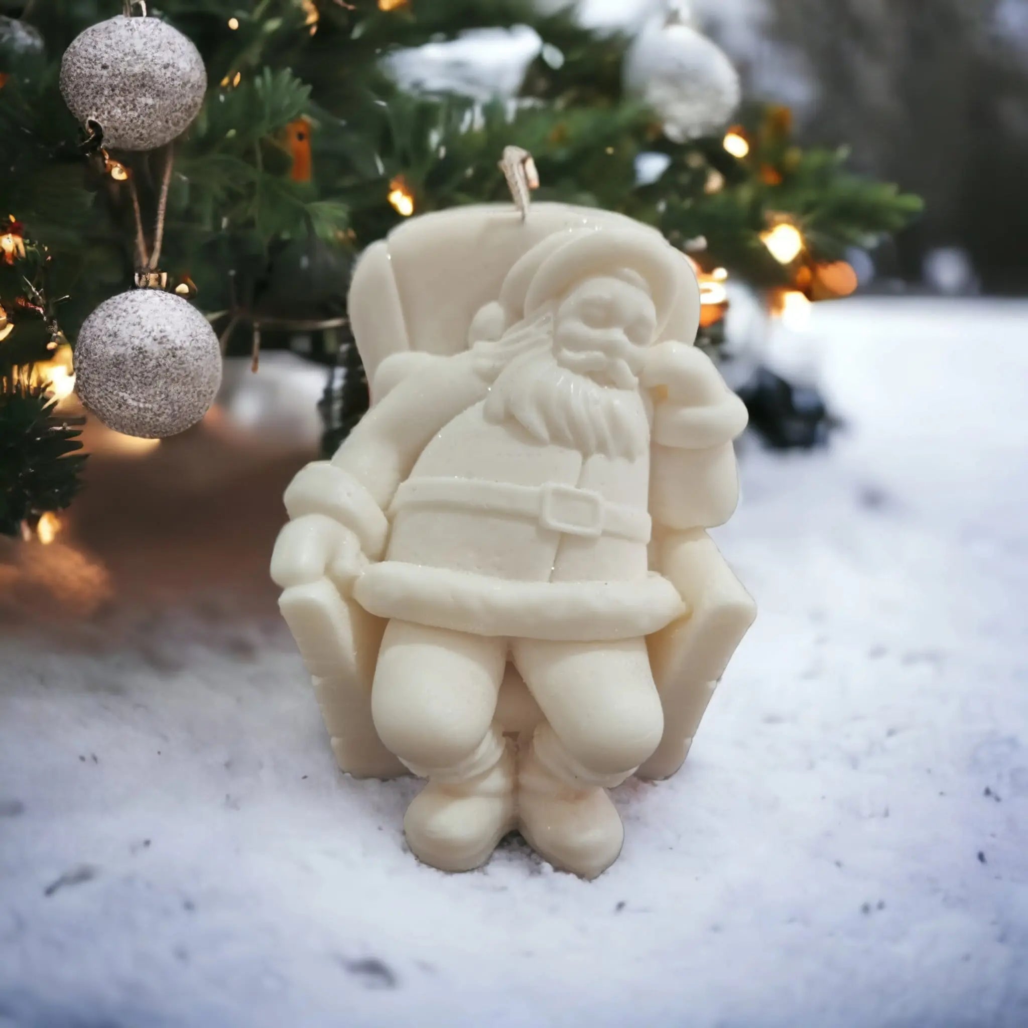 Enchanting Santa Claus Winter Glow Figurine in red suit, radiating warm light, perfect for holiday decor.