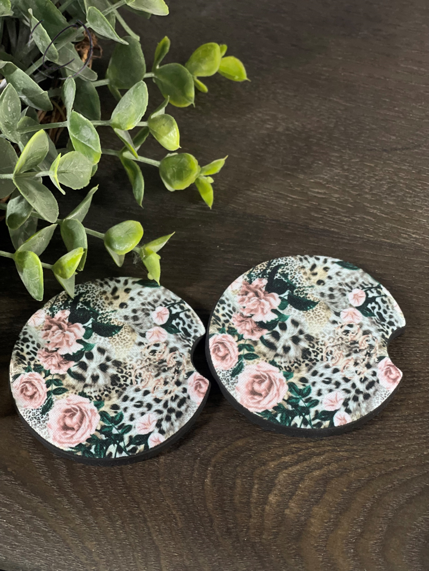 Feisty Floral Car Coaster Set featuring vibrant floral design on durable neoprene material, perfect for car cup holders.