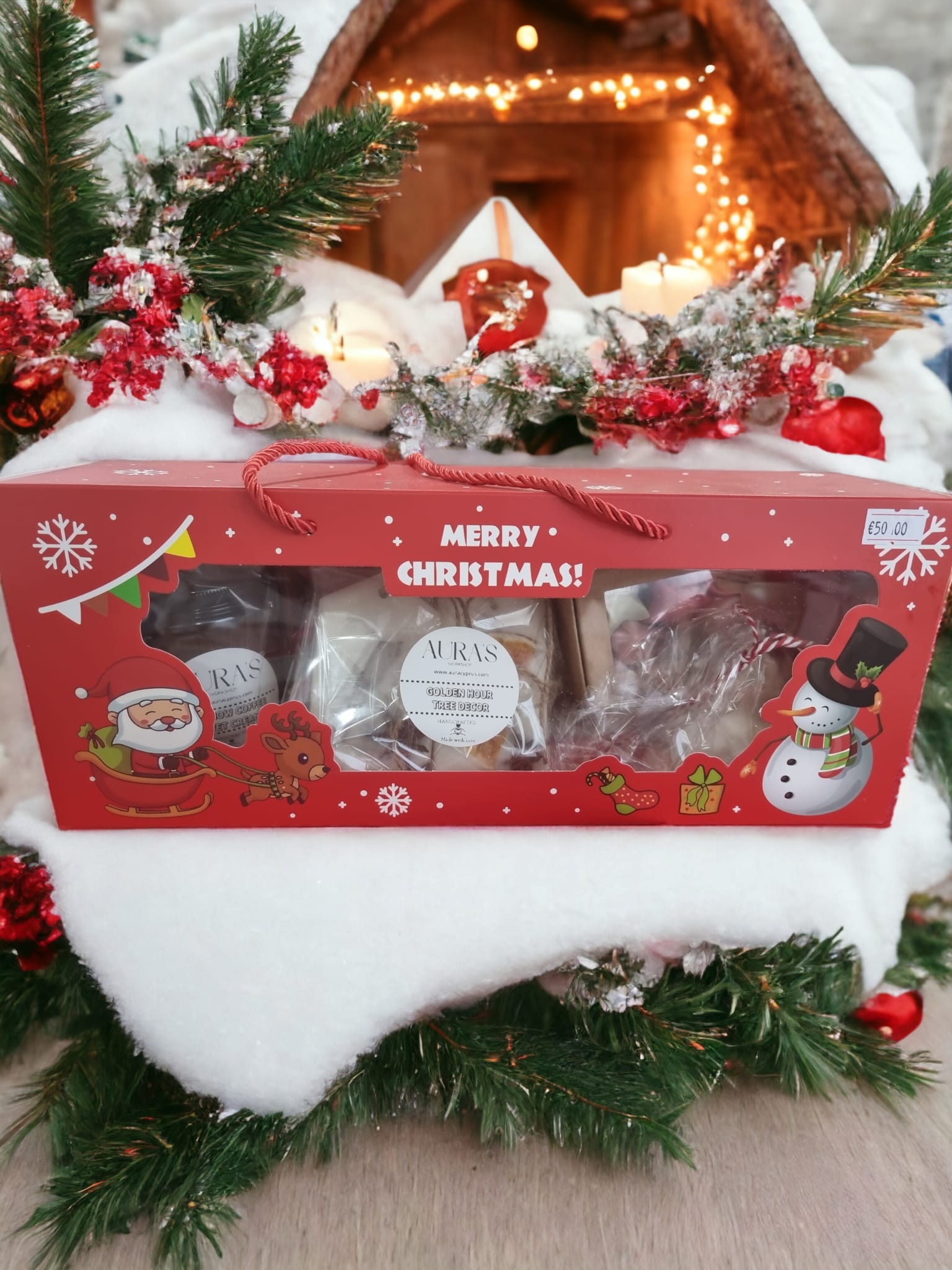 Festive Wonderland Collection gift box featuring scented candles, wax melts, bath salts, artisanal soaps, and decorative elements for the holiday season.