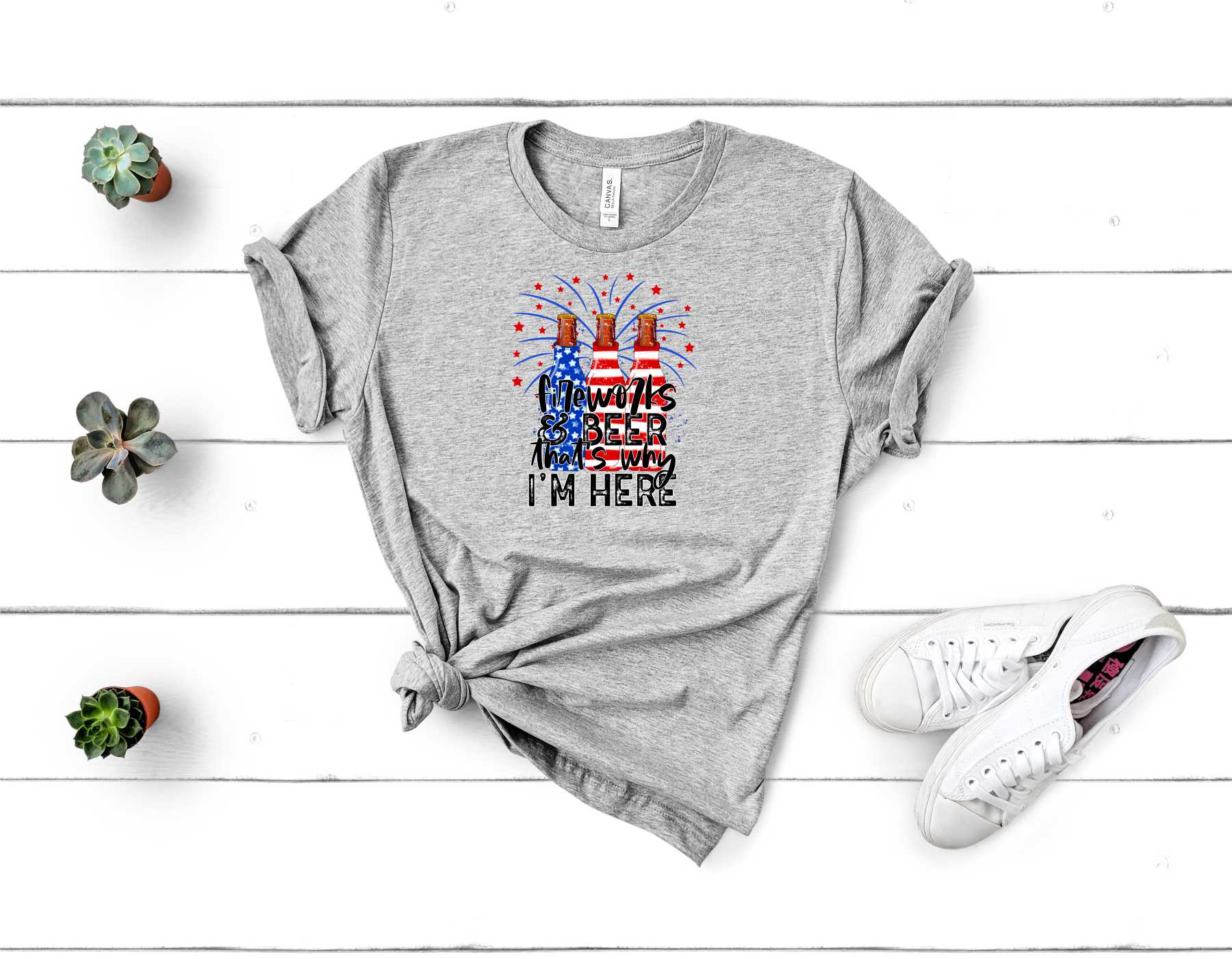 Unisex graphic tee featuring a colorful fireworks design with the text 'That's Why I'm Here'.