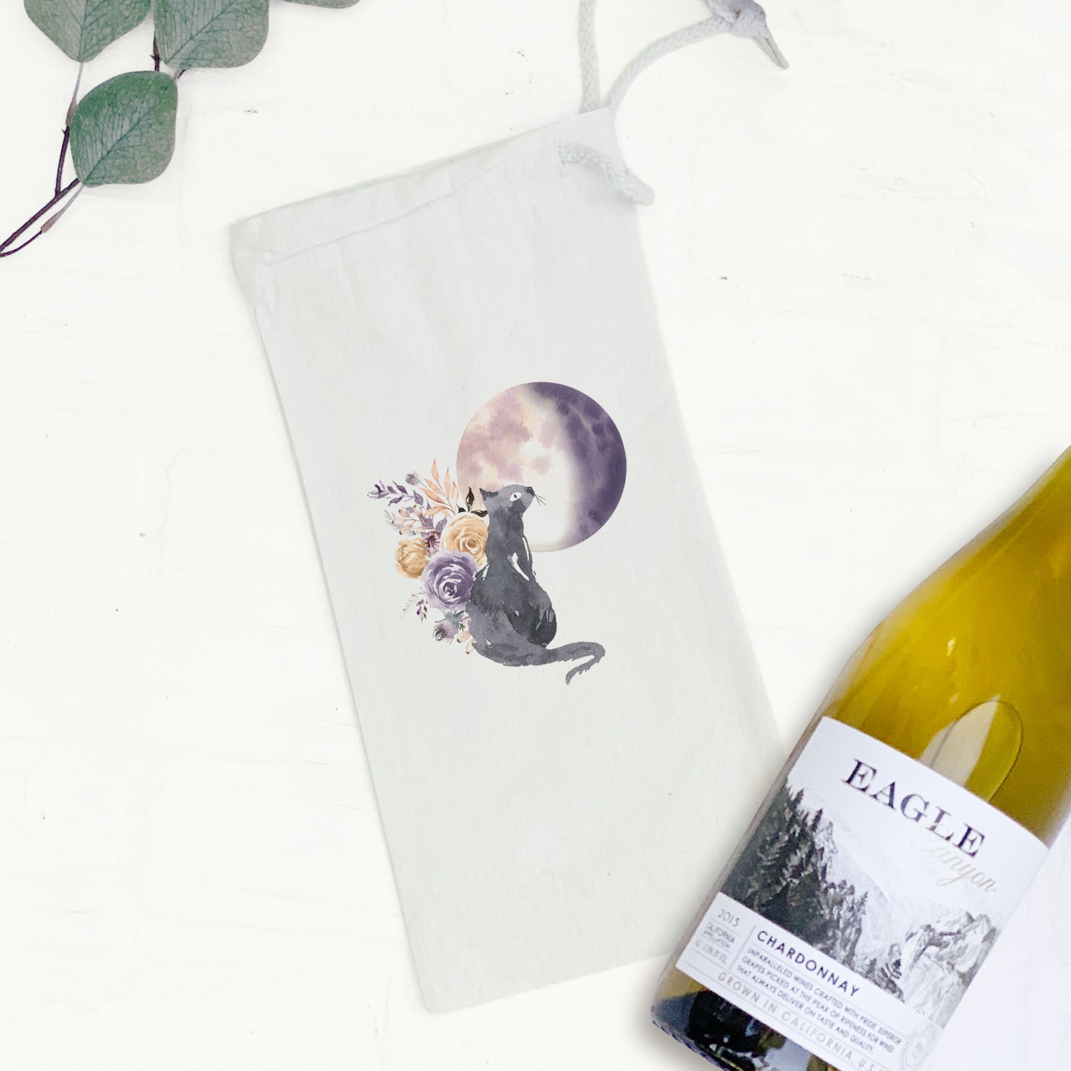 Floral Black Cat Canvas Wine Bag featuring a whimsical design with a black cat and floral patterns, perfect for carrying wine bottles.