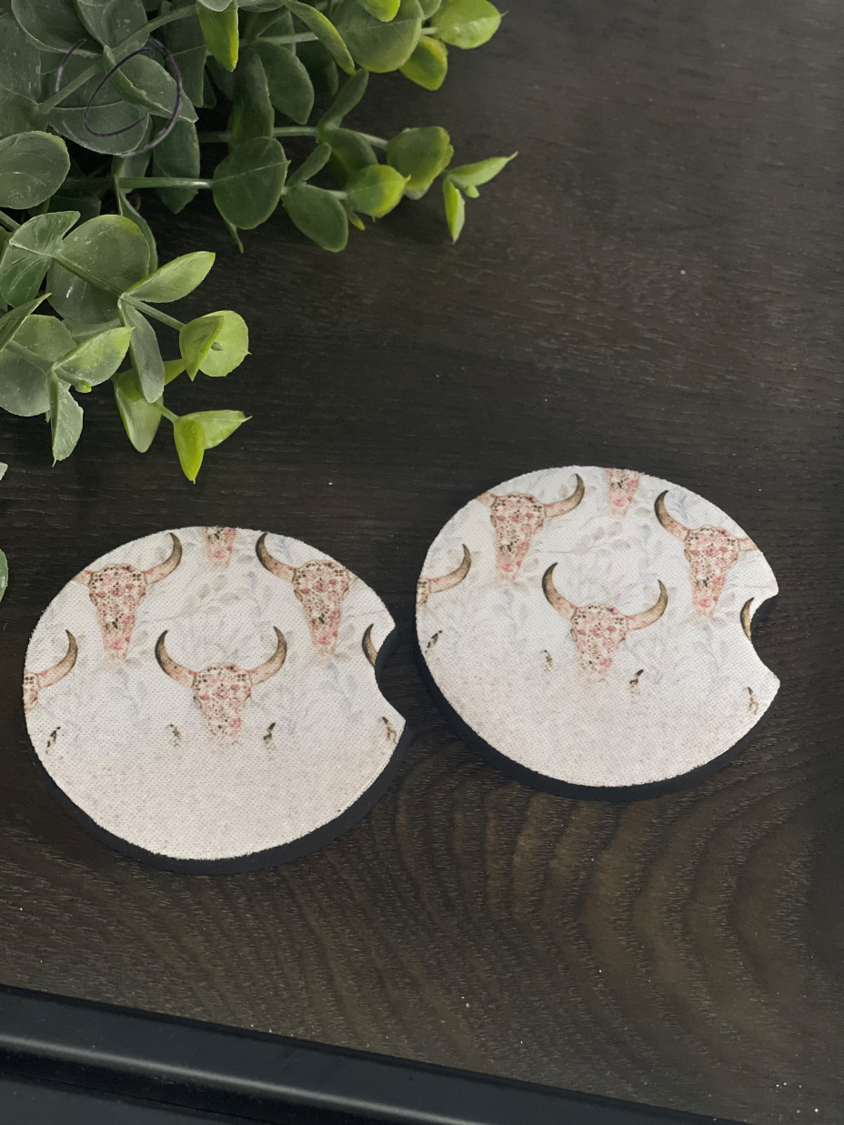 Floral Bull Skull car coasters featuring a vibrant floral design on durable neoprene material, perfect for cup holders.