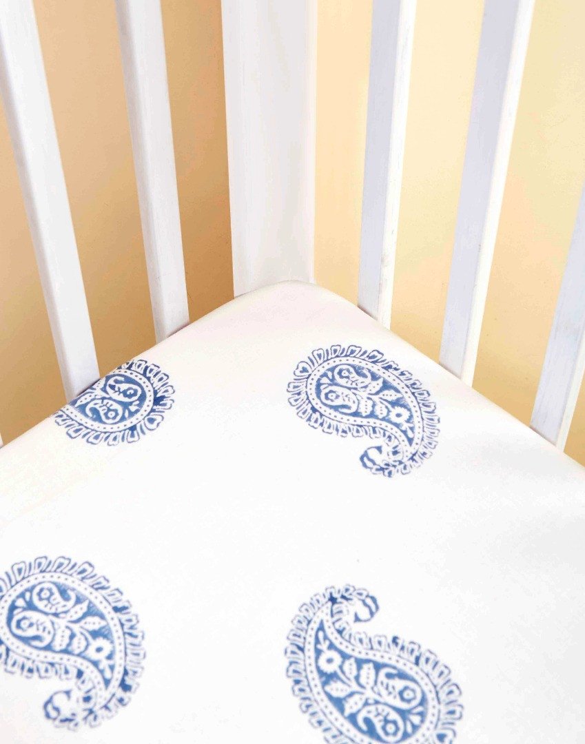 FORT Fitted Crib Sheet made from 100% Indian cotton voile, featuring concealed elastic for a snug fit and unique handcrafted design.