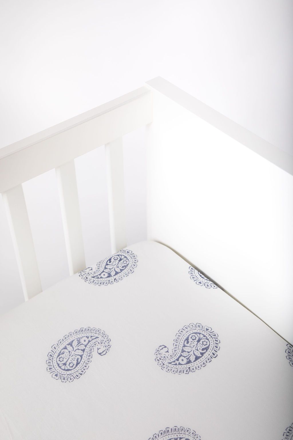 FORT Fitted Crib Sheet made from 100% Indian cotton voile, featuring concealed elastic for a snug fit and unique handcrafted design.