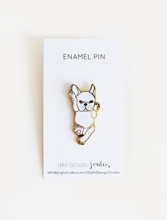 White French Bulldog enamel pin on a backing card, showcasing its cute design and high-quality finish.