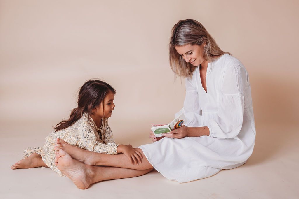 A beautiful white girl's cotton kaftan dress made from soft Indian cotton voile, perfect for various occasions.