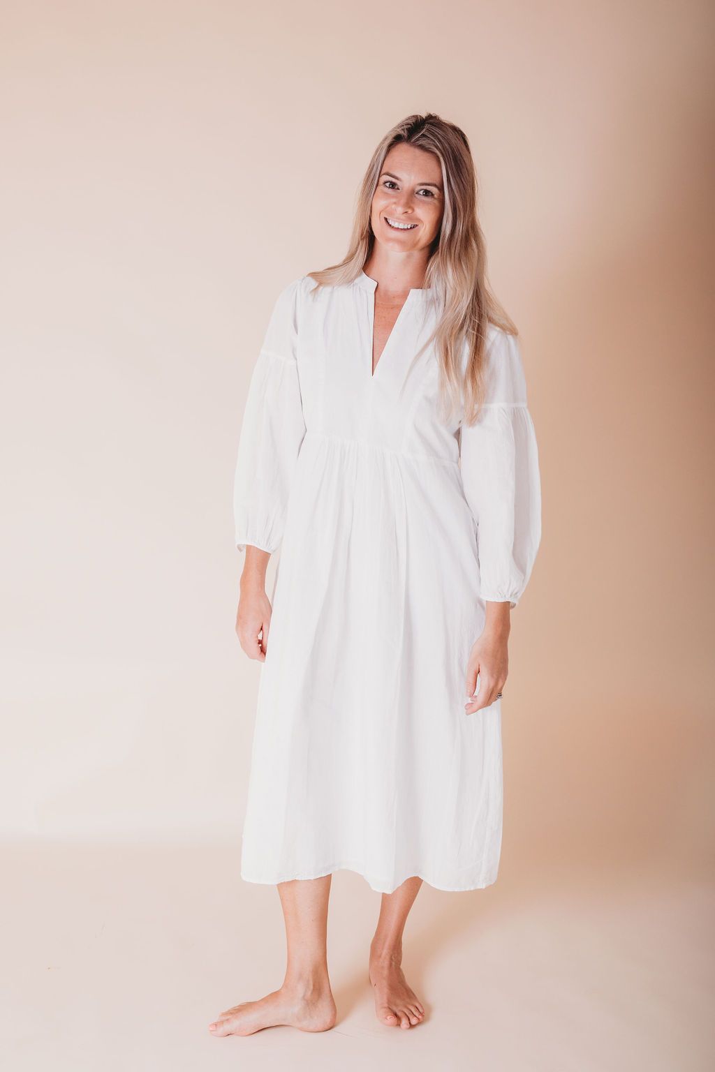 A beautiful white girl's cotton kaftan dress made from soft Indian cotton voile, perfect for various occasions.