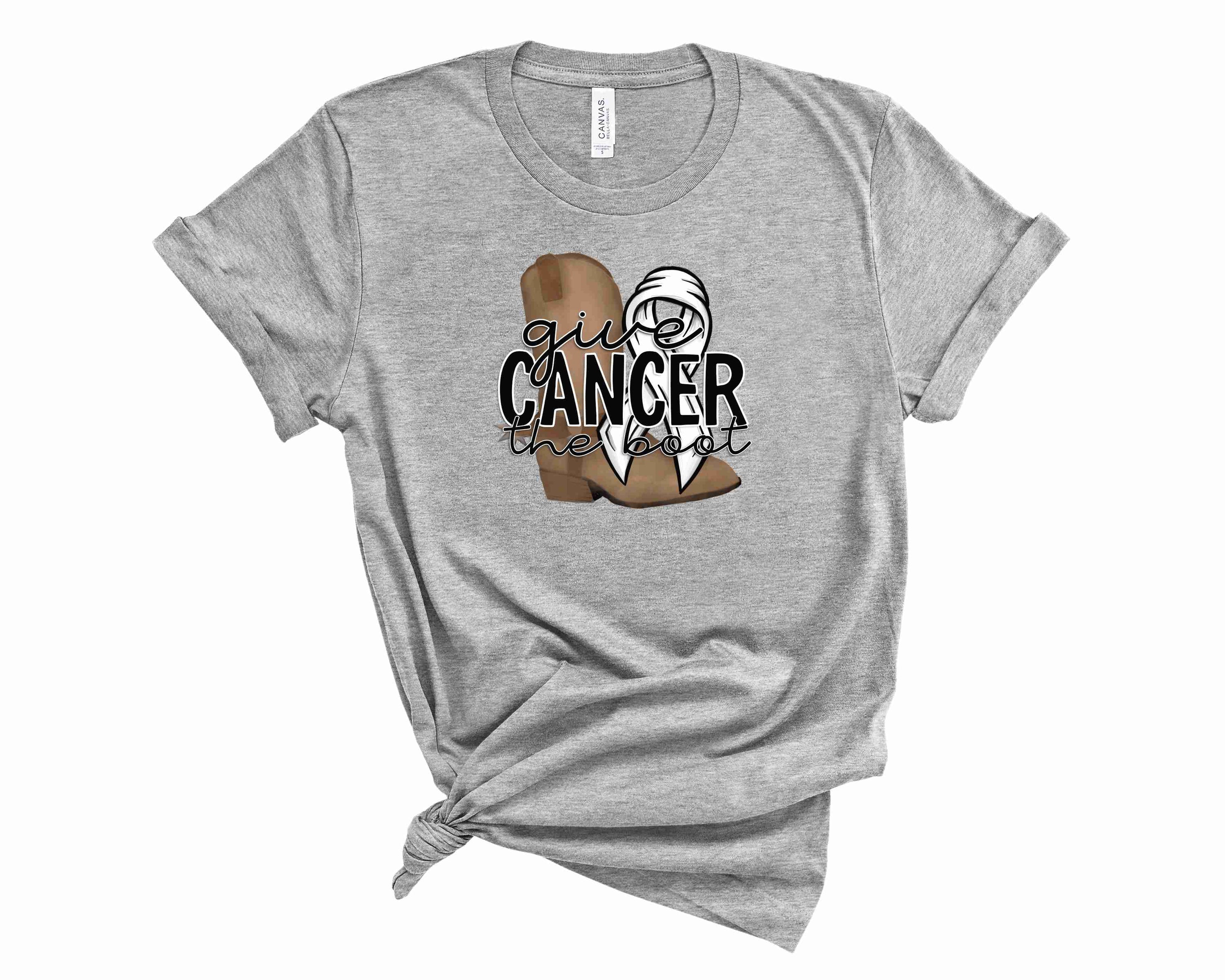 Unisex white graphic tee featuring a bold white ribbon symbolizing cancer awareness.