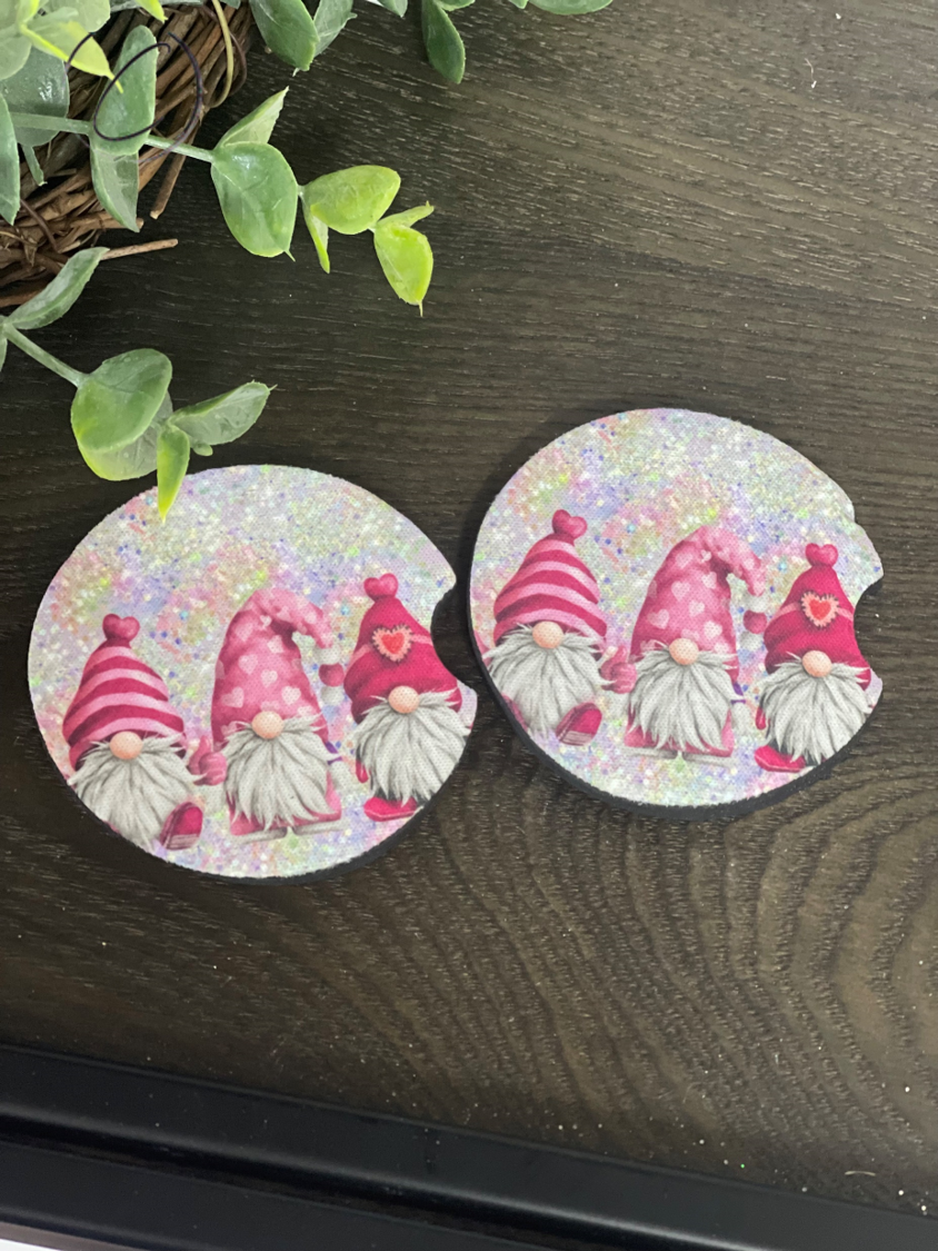 A set of Glitter Valentines Gnomes car coasters featuring colorful gnome designs, made of durable neoprene material.