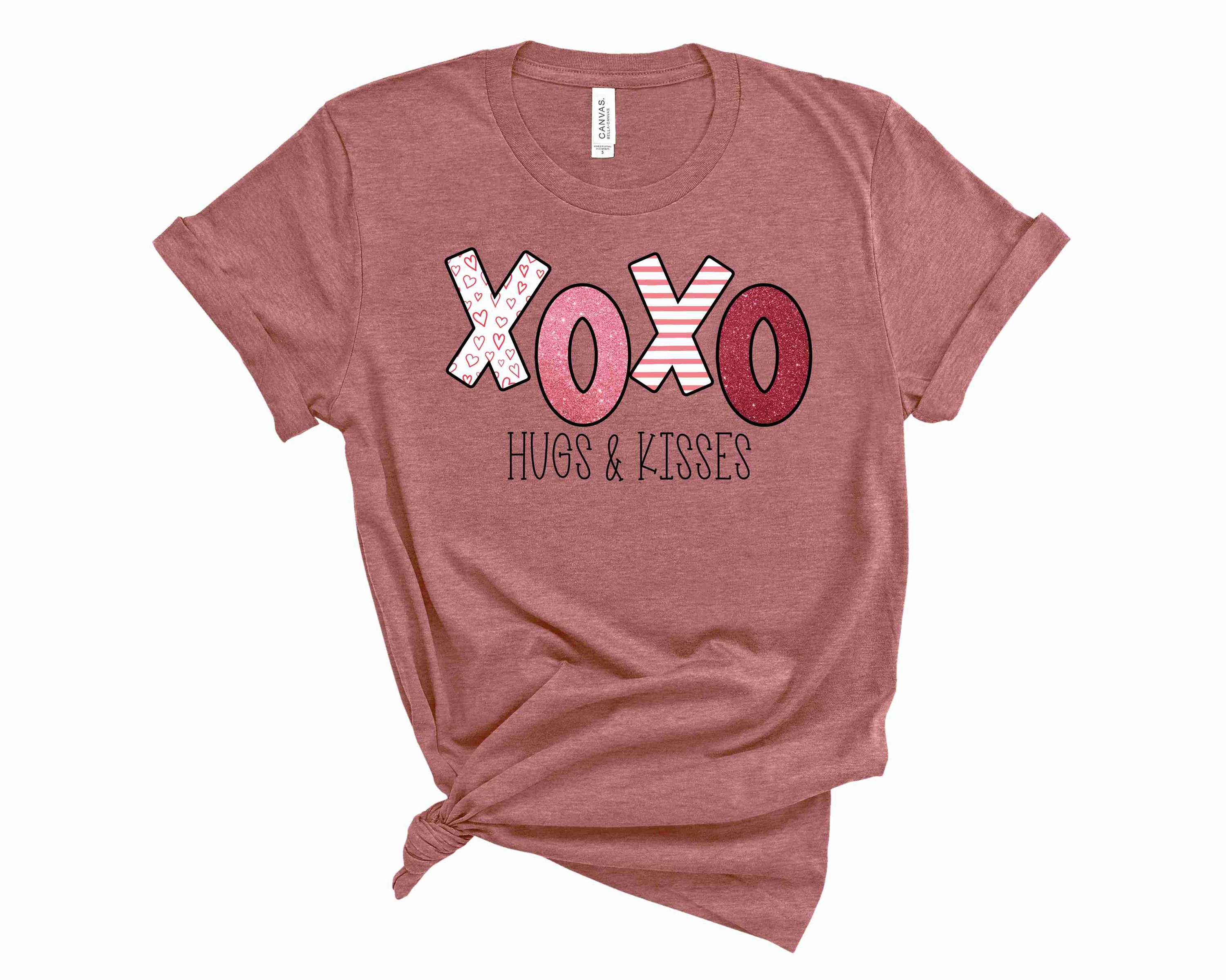Glitter XOXO Graphic Tee featuring a sparkling 'XOXO' design on a soft unisex t-shirt.