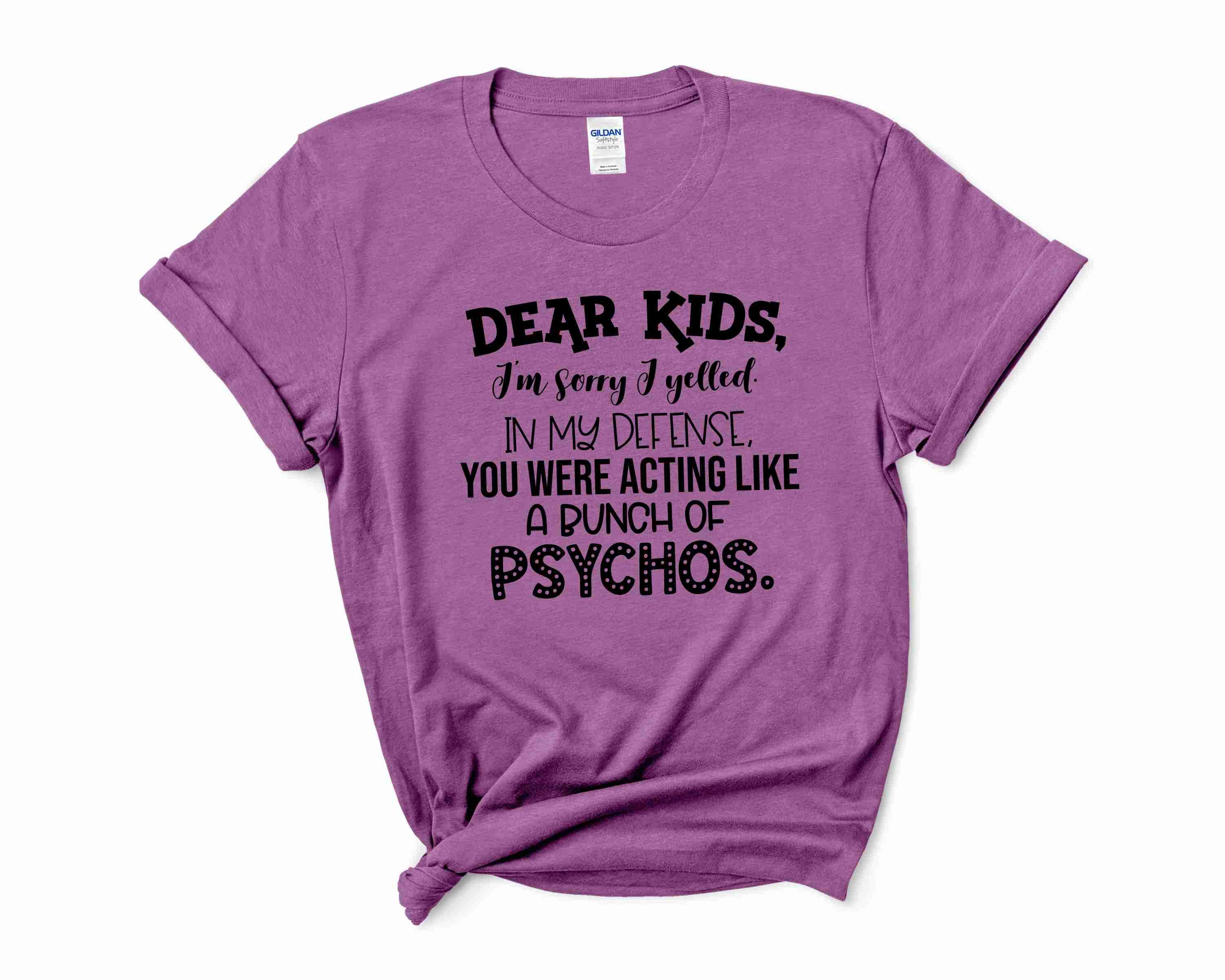 Graphic t-shirt featuring the phrase 'DEAR KIDS I'M SORRY I YELLED IN MY DEFENSE YOU WERE' on a soft fabric.