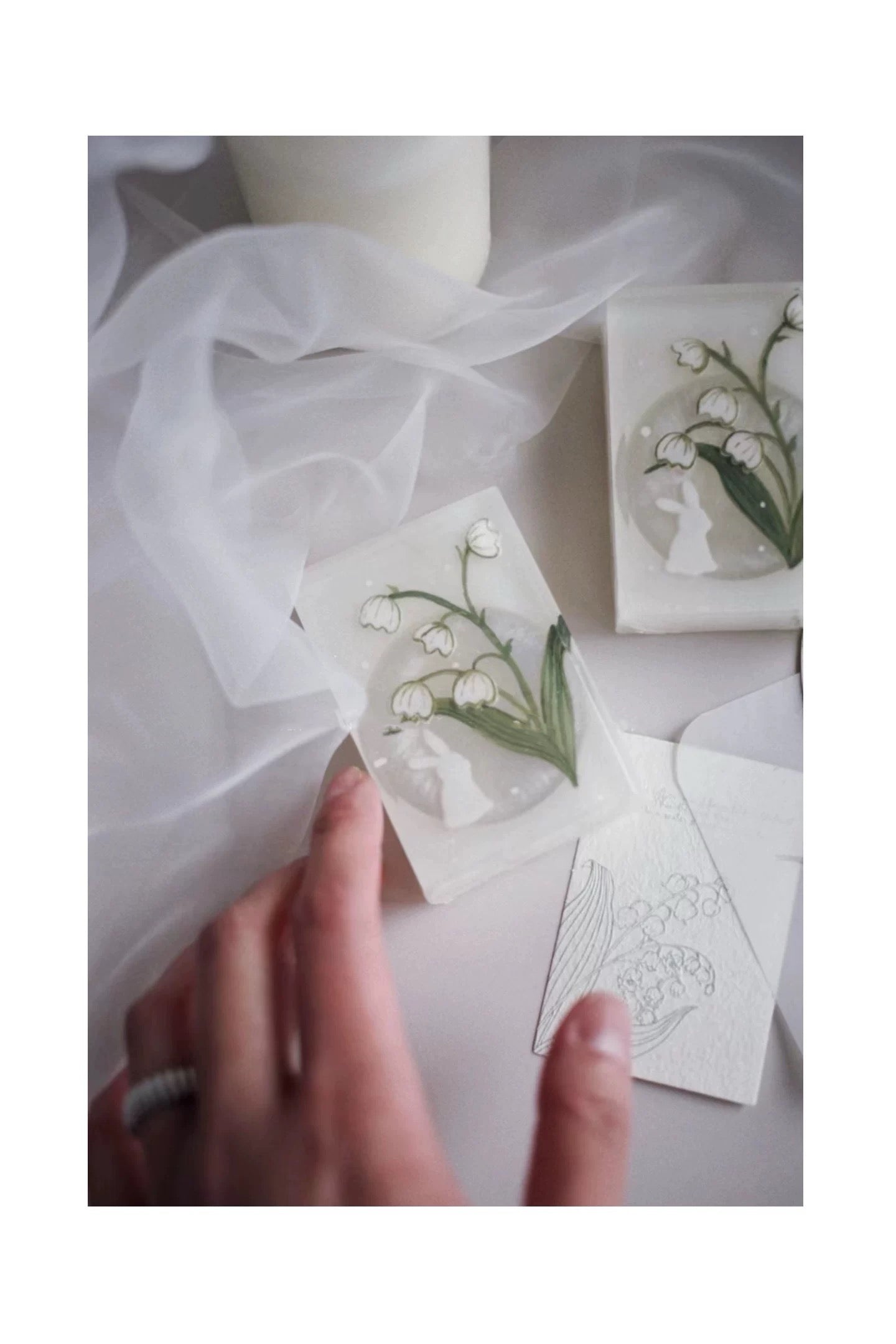 A beautifully crafted bar of Handmade Lily of the Valley Aromatic Soap, showcasing its delicate floral design and rich texture, perfect for luxurious bathing.