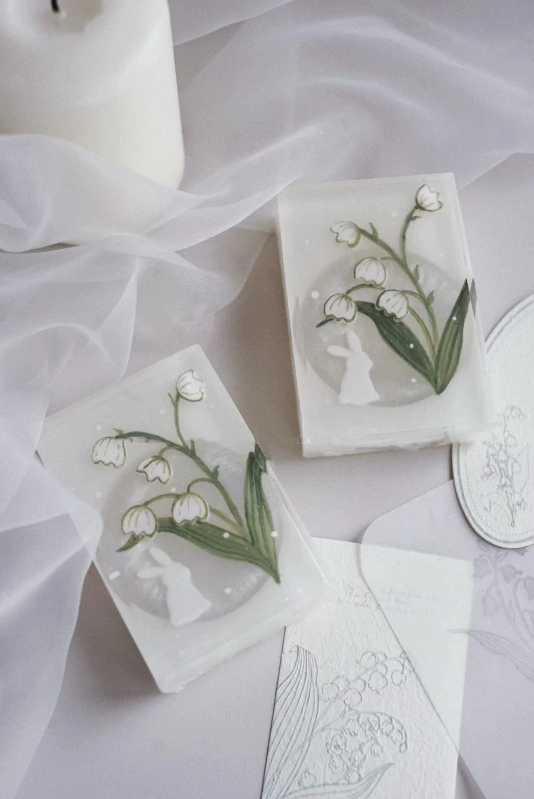 A beautifully crafted bar of Handmade Lily of the Valley Aromatic Soap, showcasing its delicate floral design and rich texture, perfect for luxurious bathing.