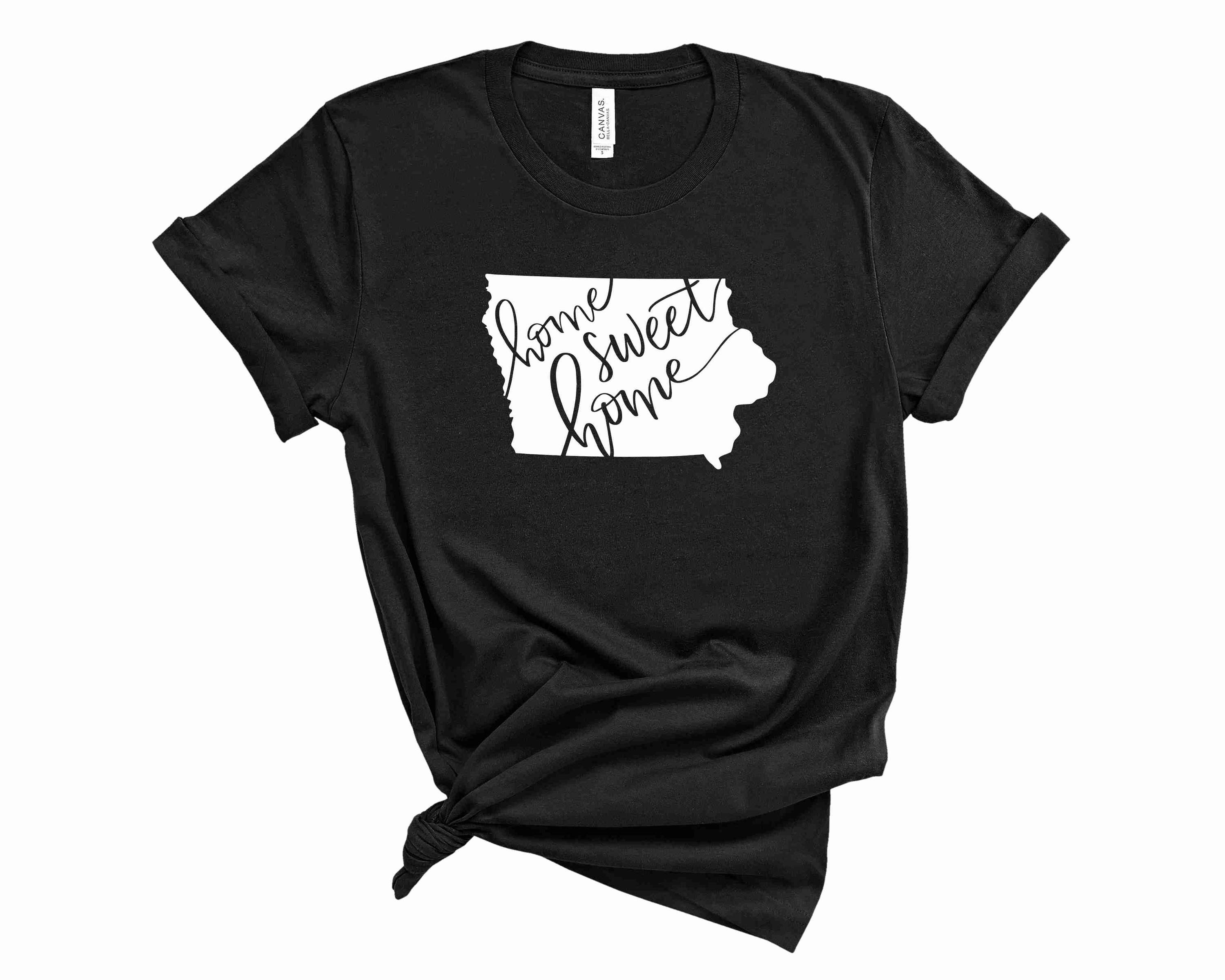 A unisex graphic tee featuring the phrase 'Home Sweet Home Iowa' in a stylish design, perfect for casual wear.