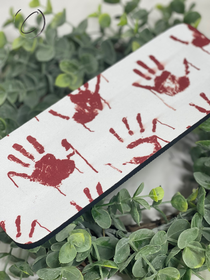 Horror Hands Slap Wrap Can Cooler featuring a spooky design, made of durable neoprene, perfect for 12oz cans and bottles.