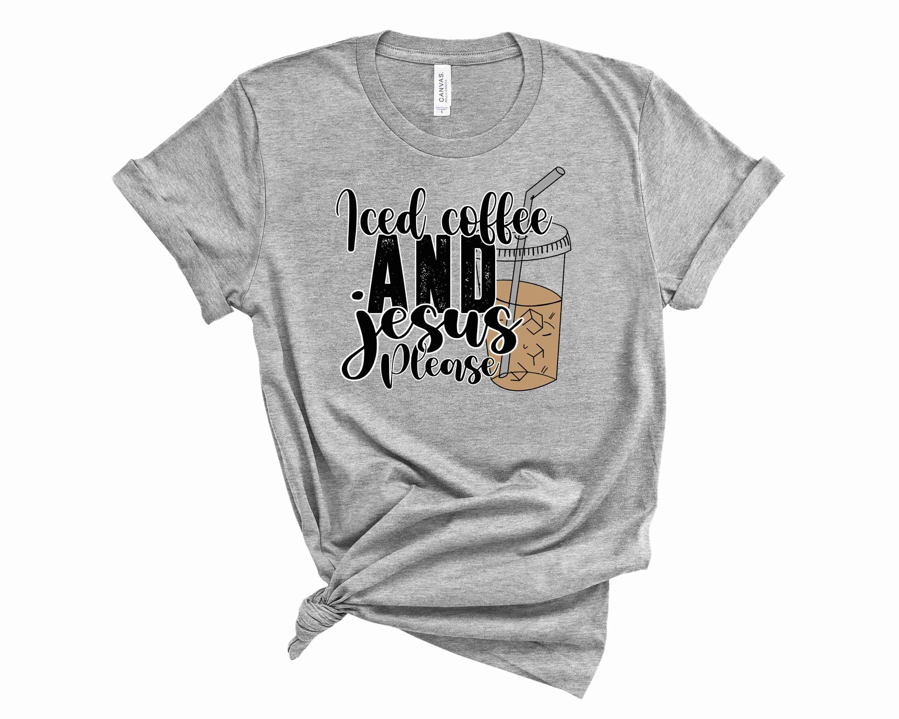 A stylish unisex graphic tee featuring the phrase 'Iced Coffee and Jesus' in bold print, perfect for coffee lovers.