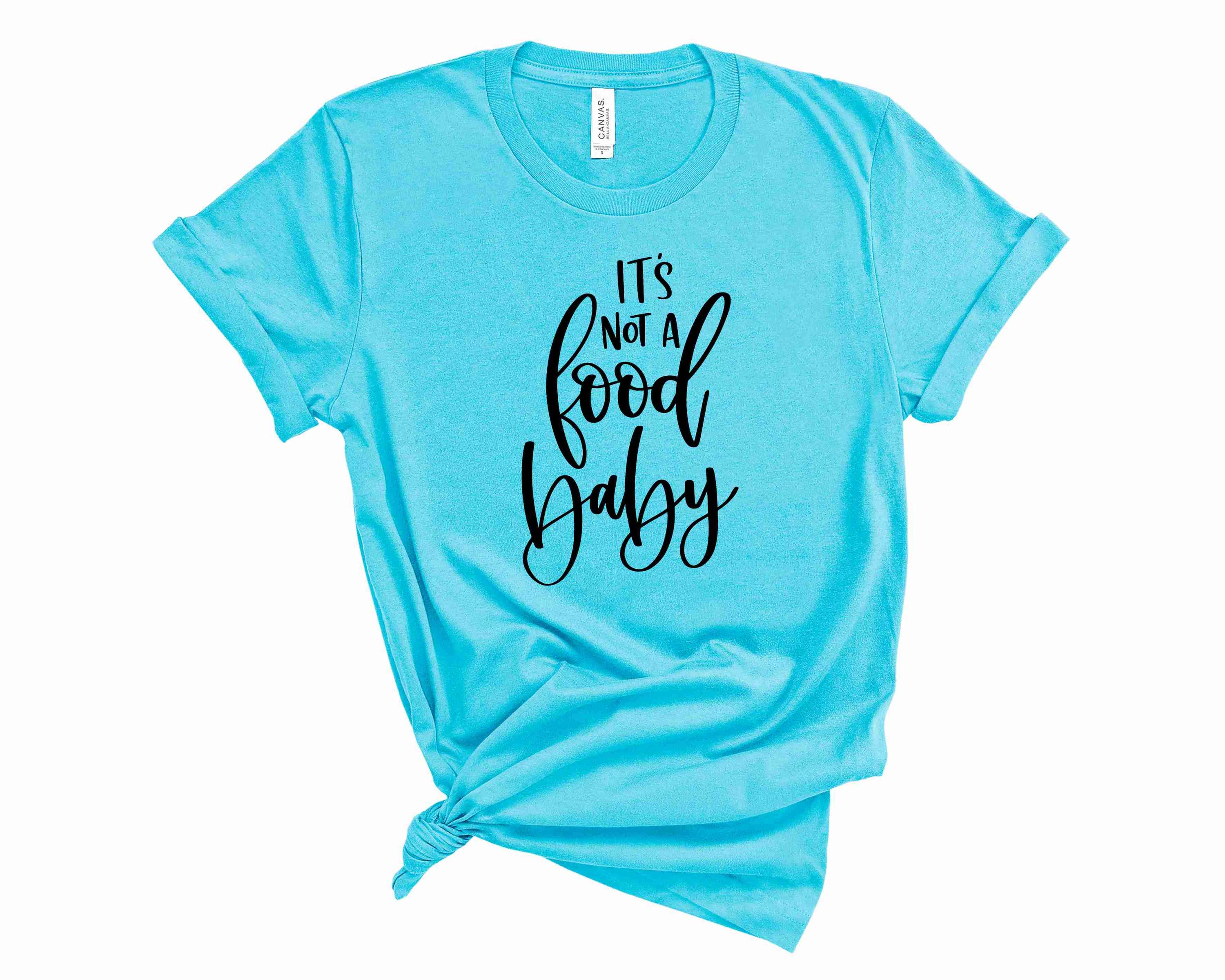 A unisex graphic tee featuring the phrase 'It's Not a Food Baby' in a playful font, perfect for casual wear.